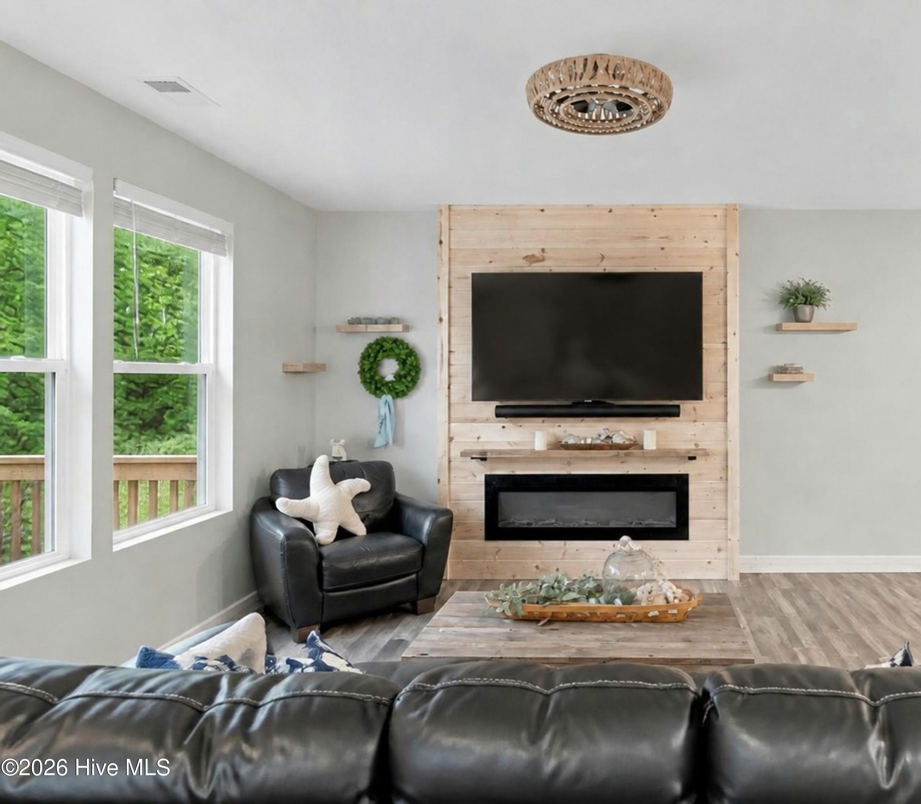 FIREPLACE IN GREAT ROOM - 2519 Sendero Drive SE, Bolivia, NC 28422