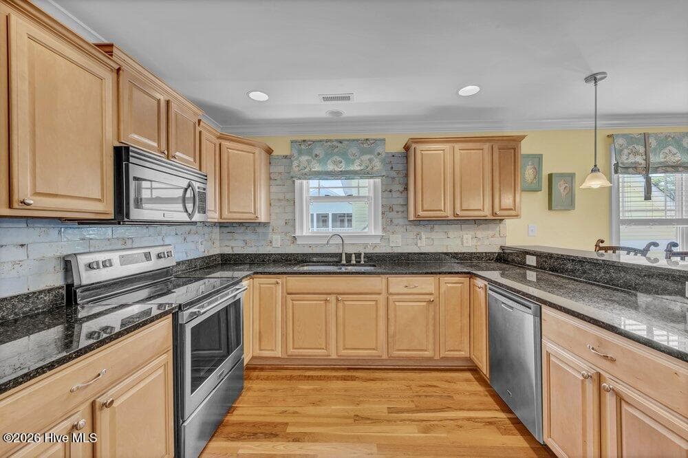 Single Family Residence at 104 NE 8th Street, Oak Island, NC 28465, photo 13 of 48