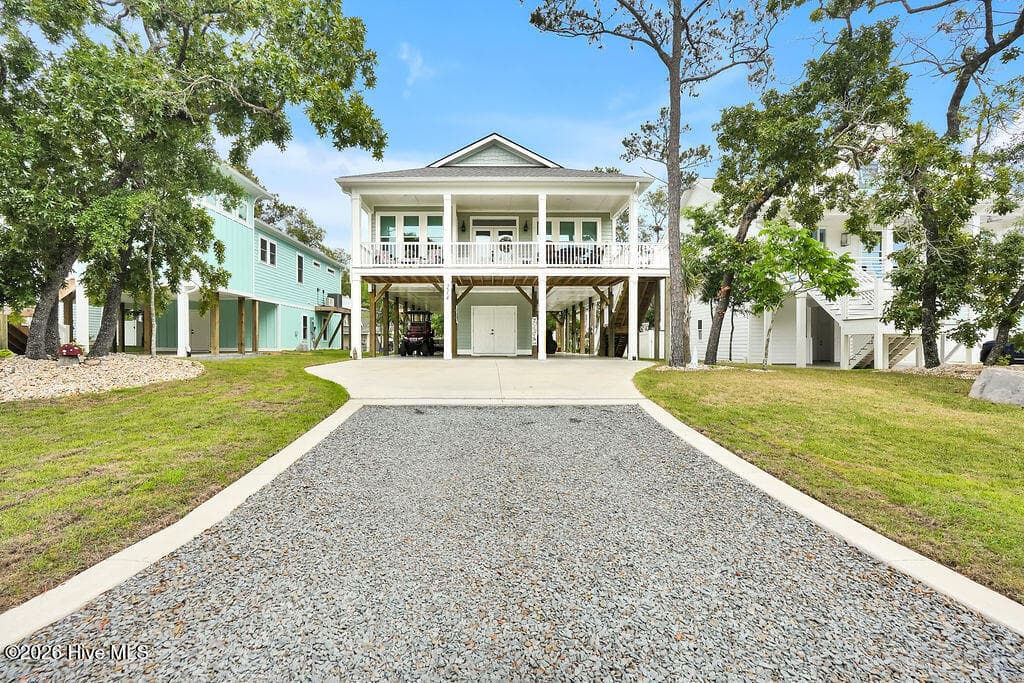 Single Family Residence at 214 NE 37th Street, Oak Island, NC 28465, photo 2 of 2