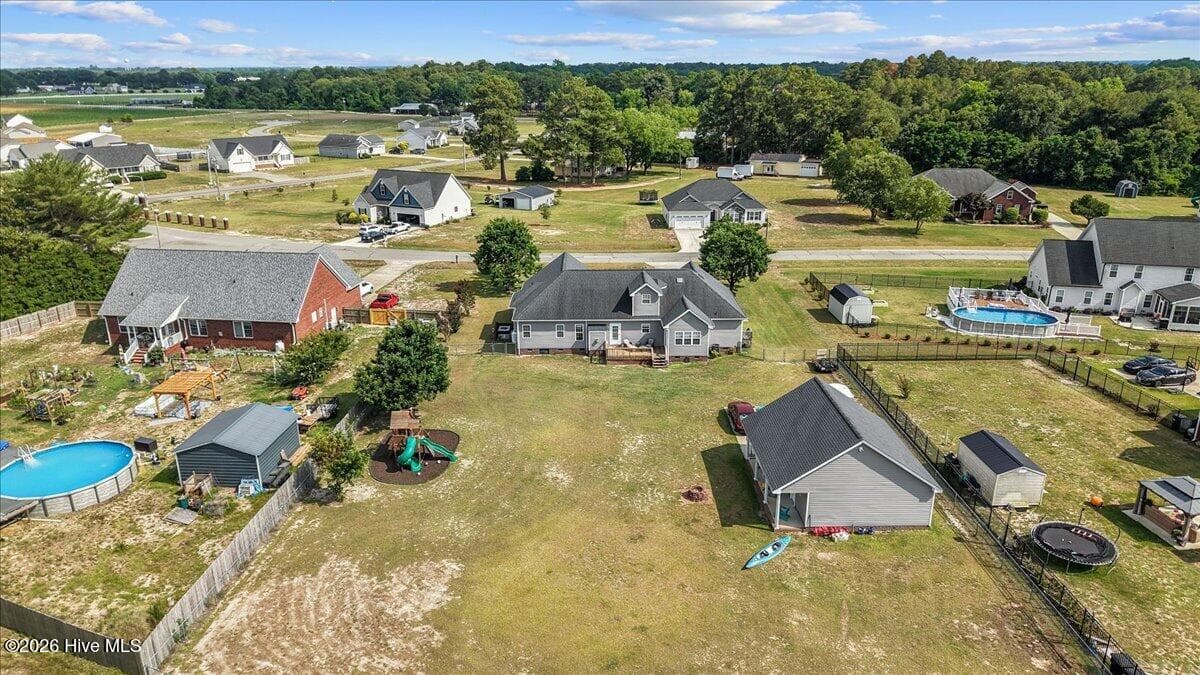 Large back yard view from back - 105 Pointe Drive, La Grange, NC 28551