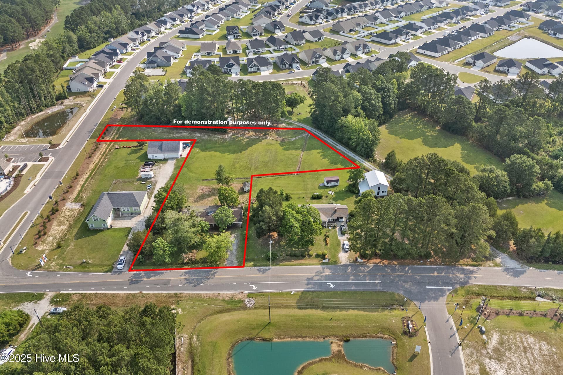 Outline in red is the proposed area to convey with the manufactured home at 670 Calabash Road - 670 Calabash Road NW, Calabash, NC 28467