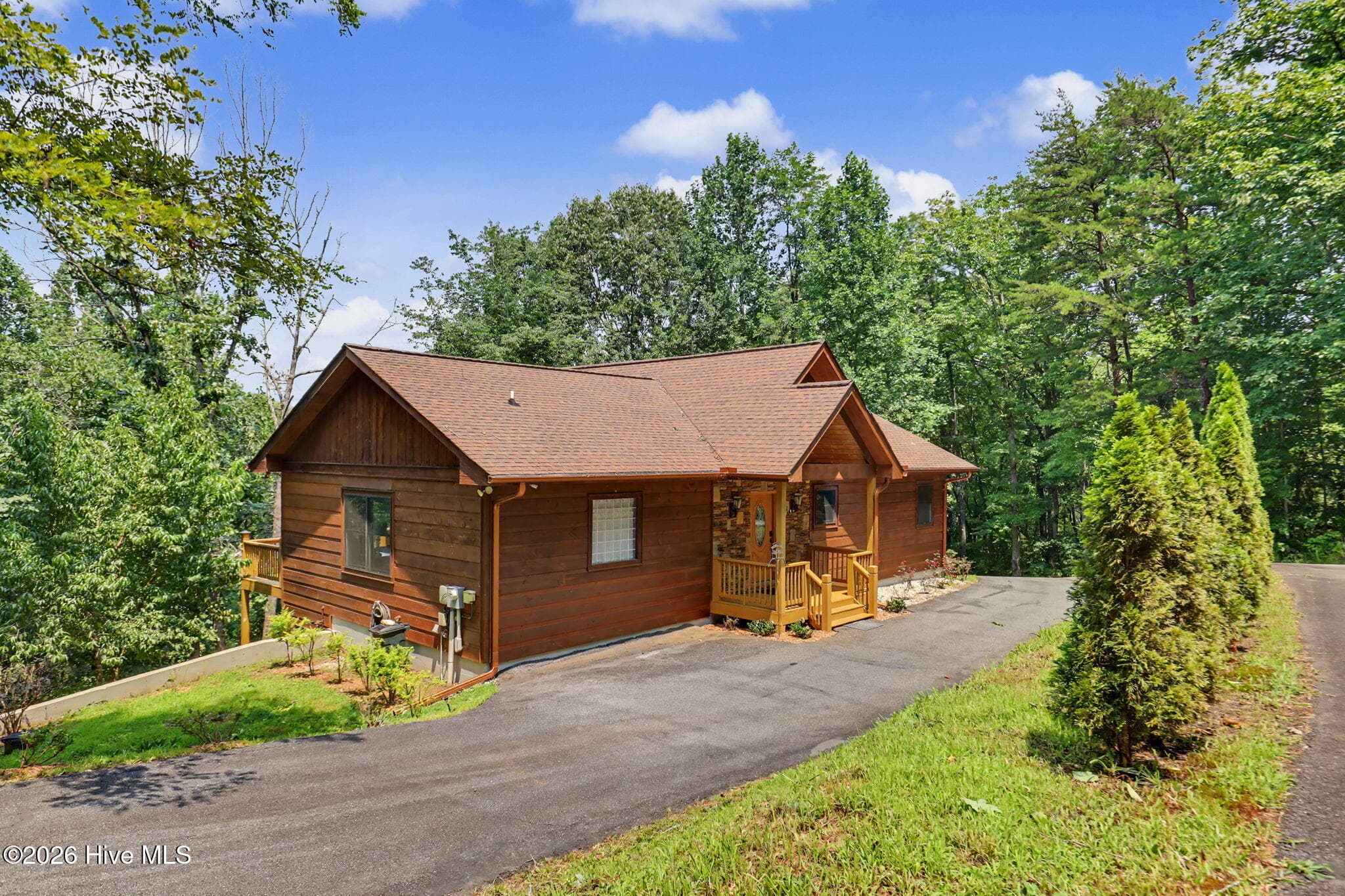 Paved driveway provides easy access to the home. - 210 Majestic Drive, Hayesville, NC 28904