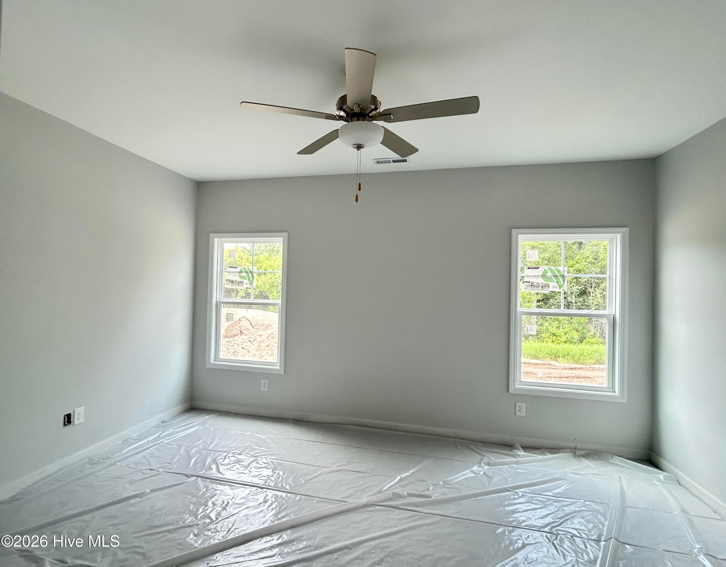 Primary suite features a Private Bathroom with Tile Shower and Large Walk-in Closet - 4149 Workman Loop 67, Leland, NC 28451