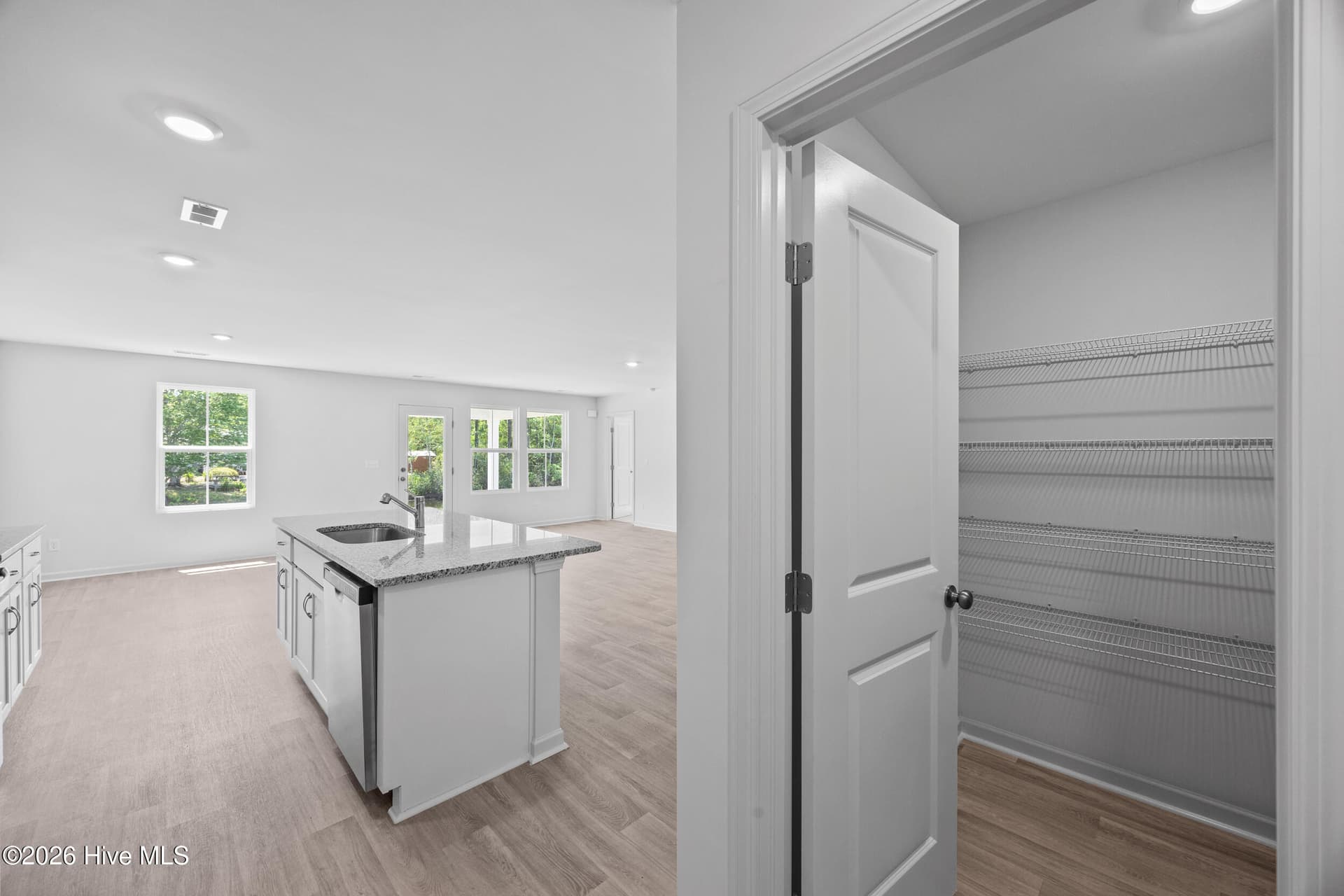 Home shown is a representation of the floor plan and may include optional features or upgrades. Elevations, materials, colors, finishes, square footage, and included features may vary from the actual home. Please consult a Sales Representative for complete details. - 4609 Swimming Lane 31, Shallotte, NC 28470