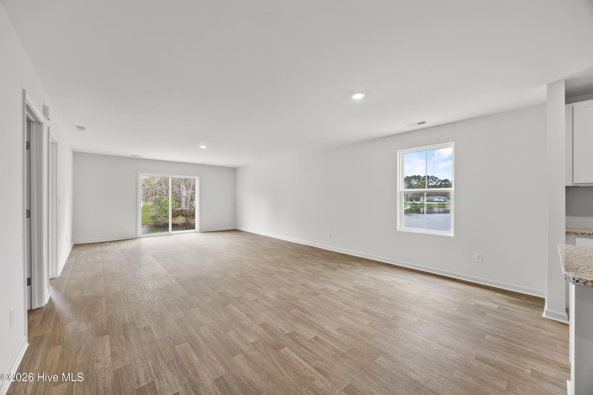 Home shown is a representation of the floor plan and may include optional features or upgrades. Elevations, materials, colors, finishes, square footage, and included features may vary from the actual home. Please consult Sales Representative for complete details. - 4613 Swimming Lane 30, Shallotte, NC 28470