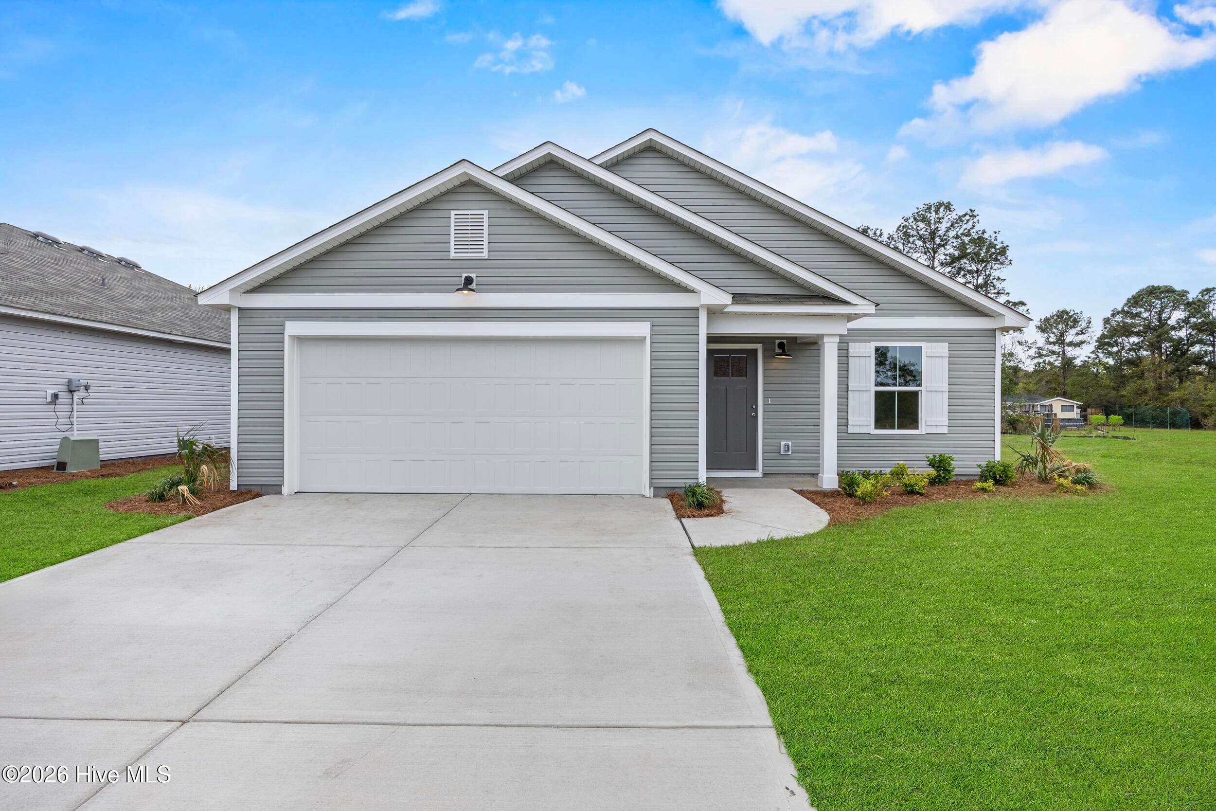 Home shown is a representation of the floor plan and may include optional features or upgrades. Elevations, materials, colors, finishes, square footage, and included features may vary from the actual home. Please consult a Sales Representative for complete details. - 4608 Swimming Lane 53, Shallotte, NC 28470, Shallotte