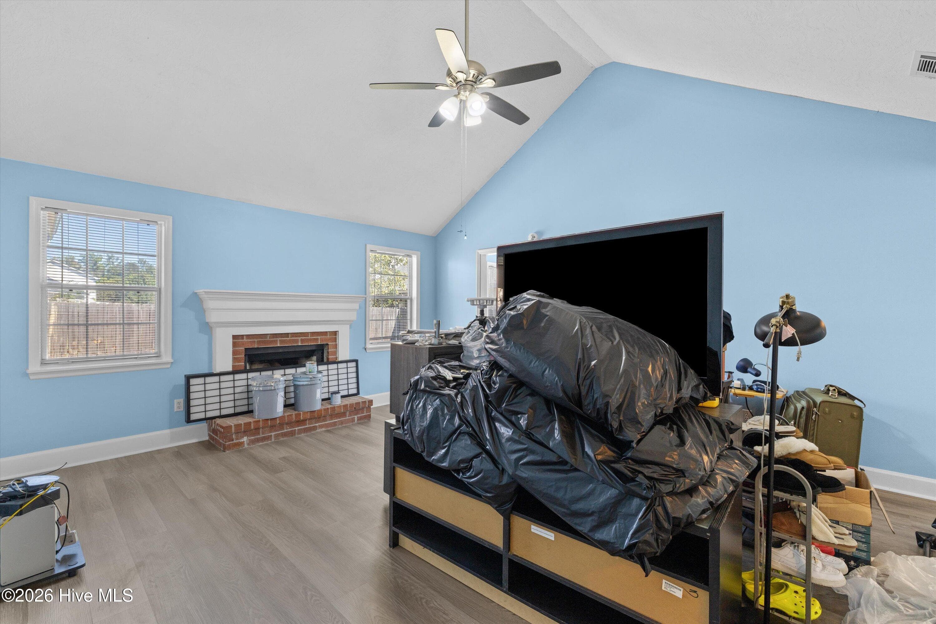 Move out in progress. Cathedral ceilings in living room - 1645 Goshen Road, Augusta, GA 30906