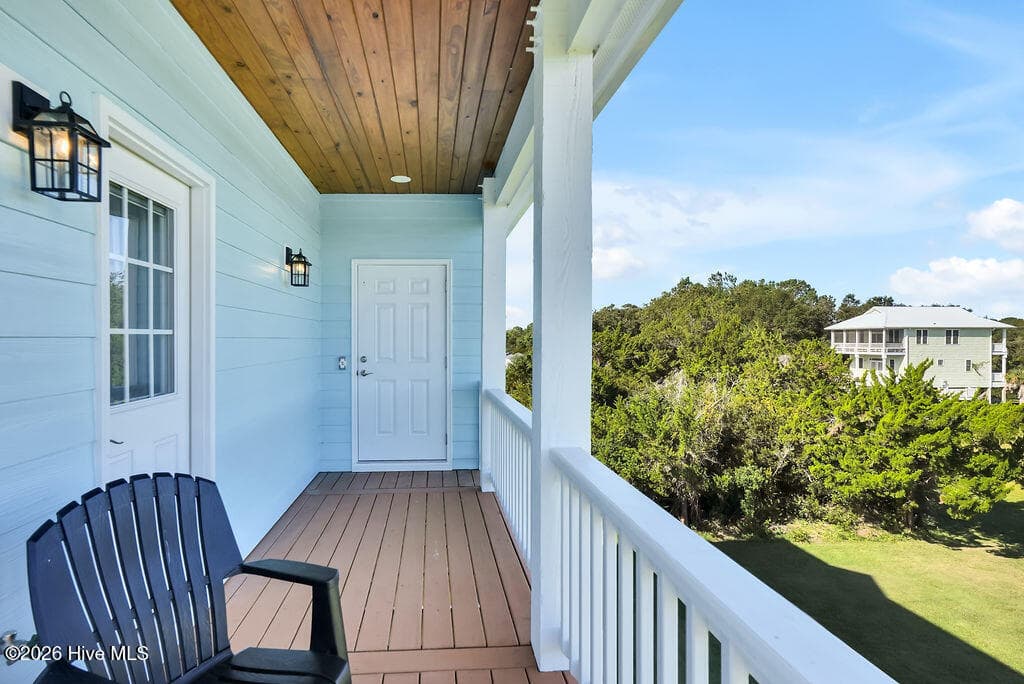 balcony off guest bedroom - 244 Grandview Drive, Sneads Ferry, NC 28460