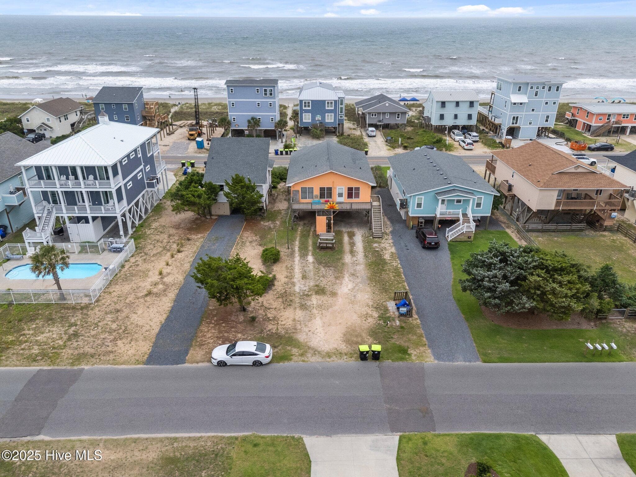 Single Family Residence at 210 W Beach Drive, Oak Island, NC 28465, photo 3 of 42