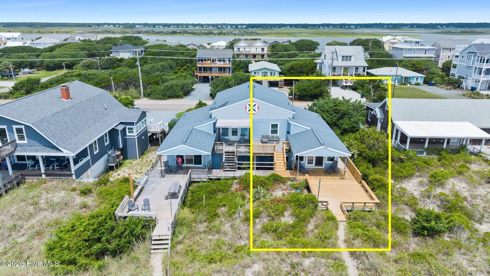 There she is — tucked into Topsail Beach with water never far away. - 129 S Anderson Boulevard A, Topsail Beach, NC 28445