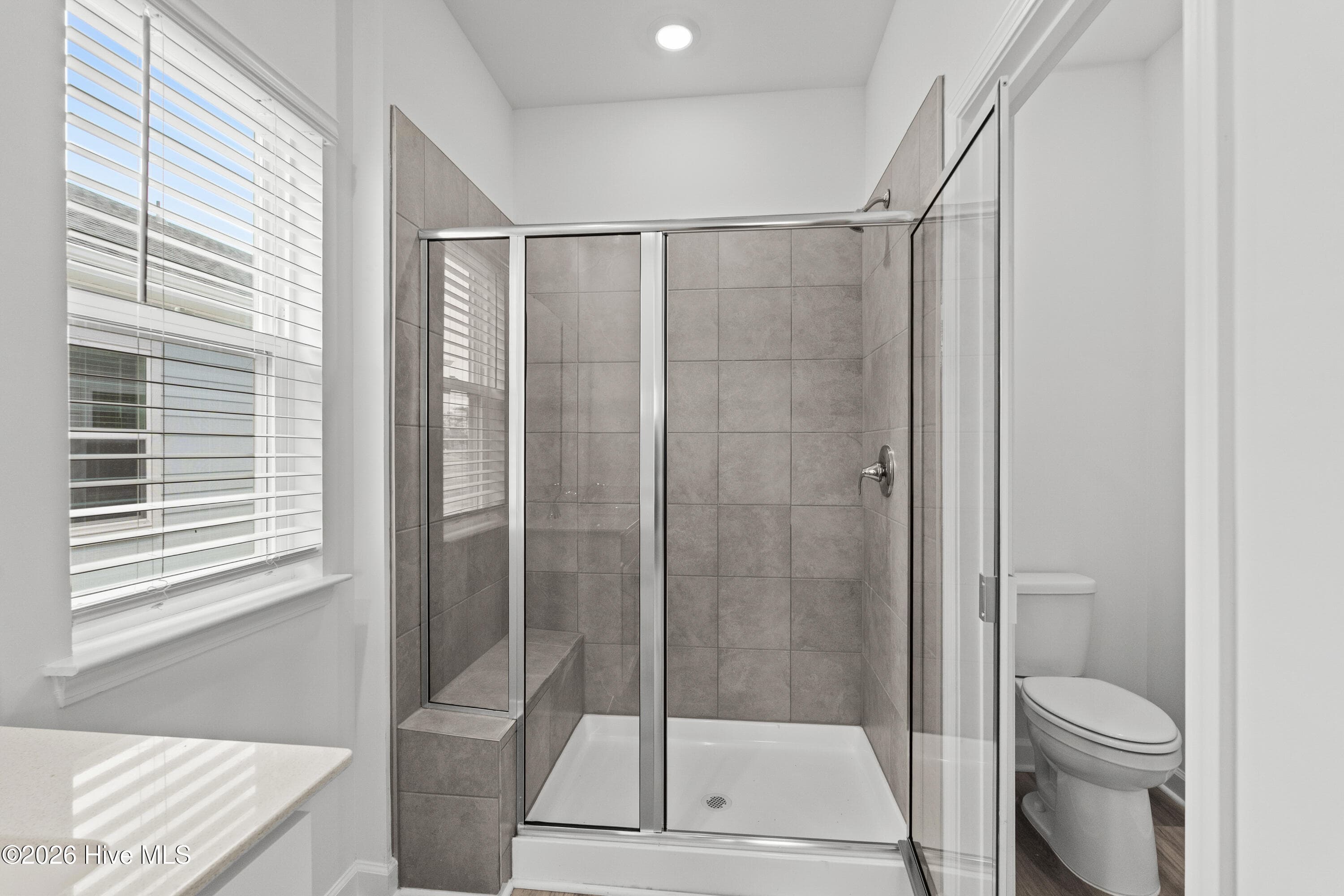 Photo is not of the actual home, but is an example photo of a completed home and may depict options and/or features that are not included - 2217 Lewis Allen Crossing NW, Ash, NC 28420