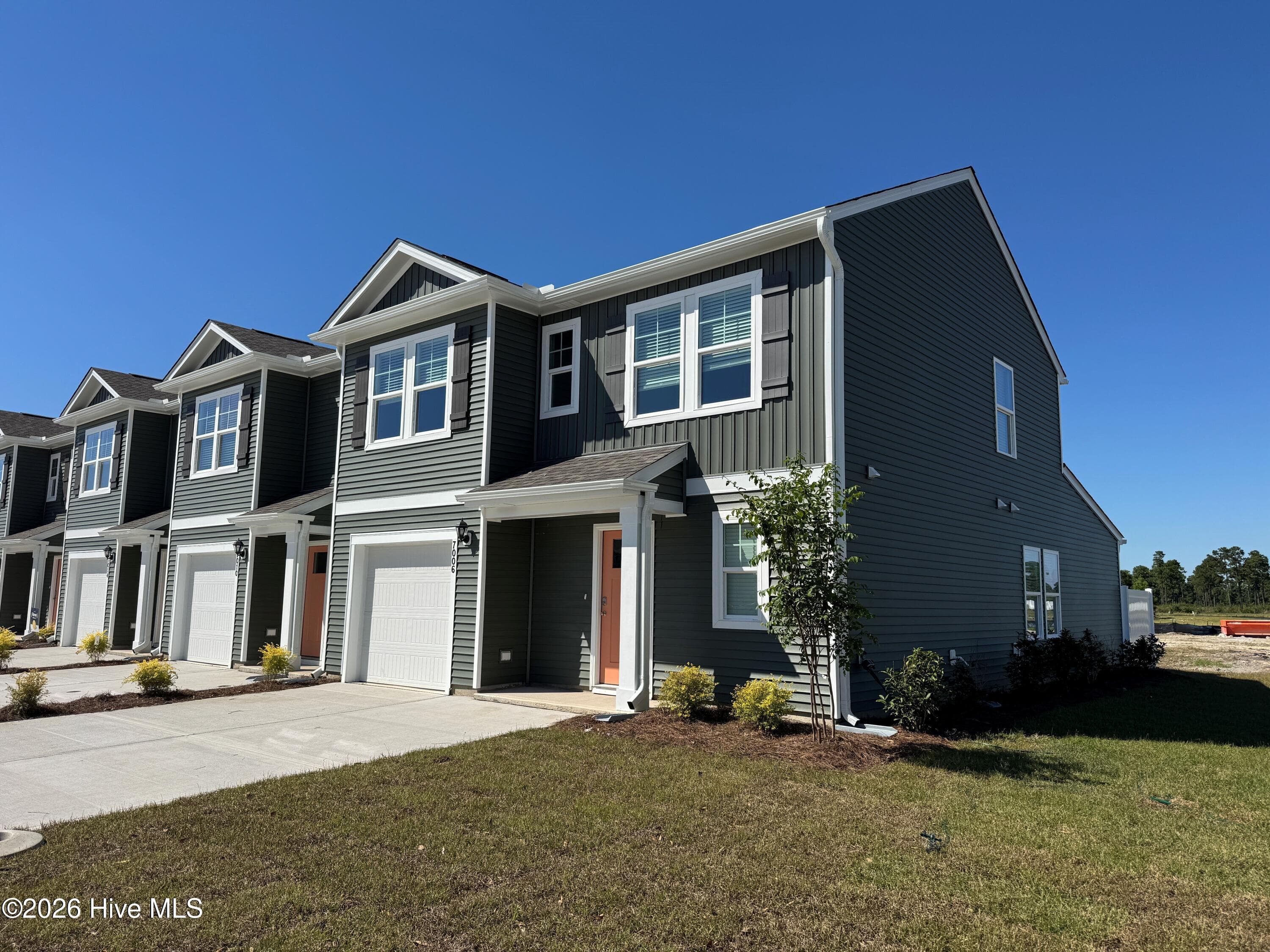similar townhome for illustrative purposes only. actual townhome will vary in colors and options. - 7018 Dunford Road Unit 116, Leland, NC 28451