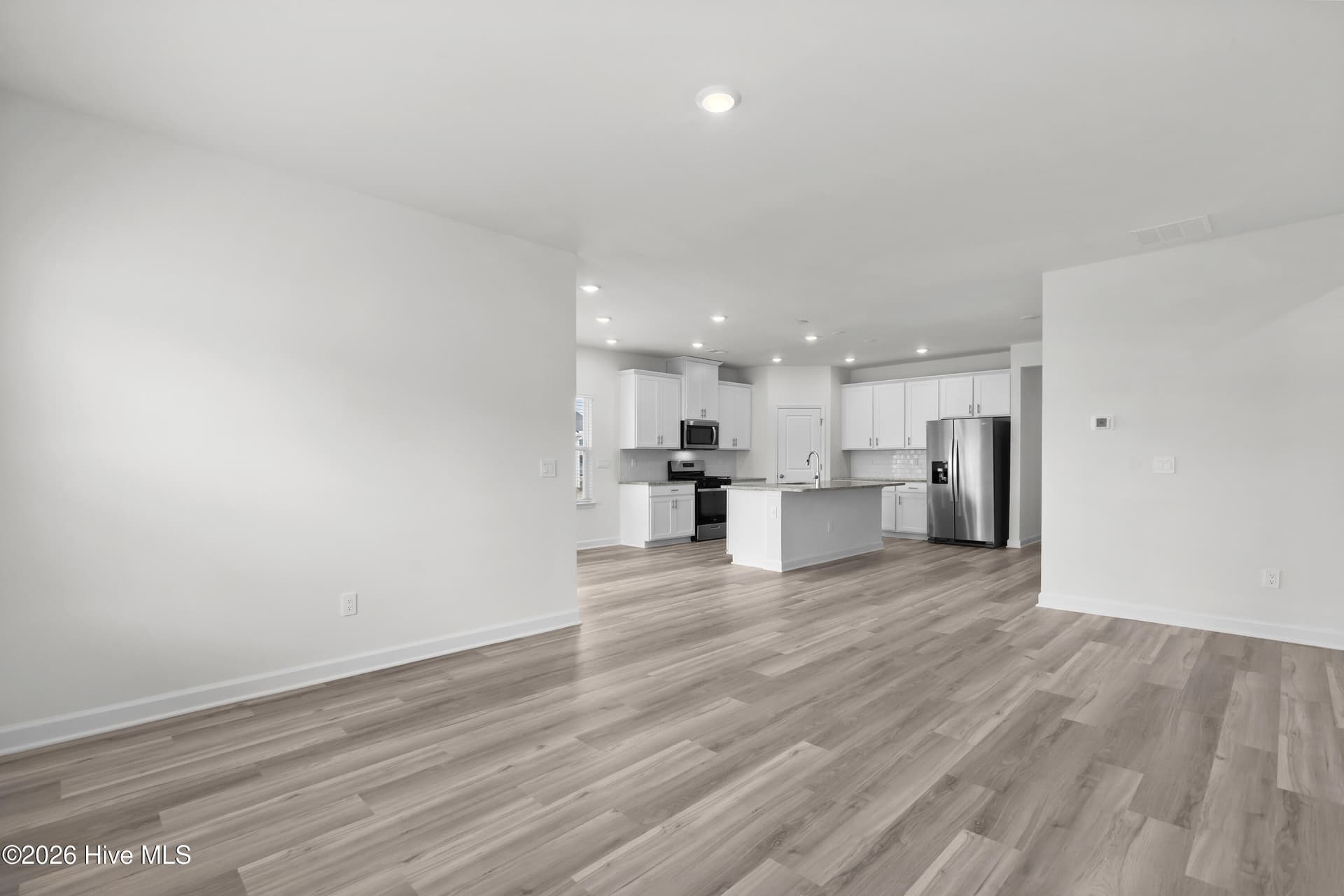 Photo is not of the actual home, but is an example photo of a completed home and may depict options and/or features that are not included - 4154 Generations Circle NW, Ash, NC 28420