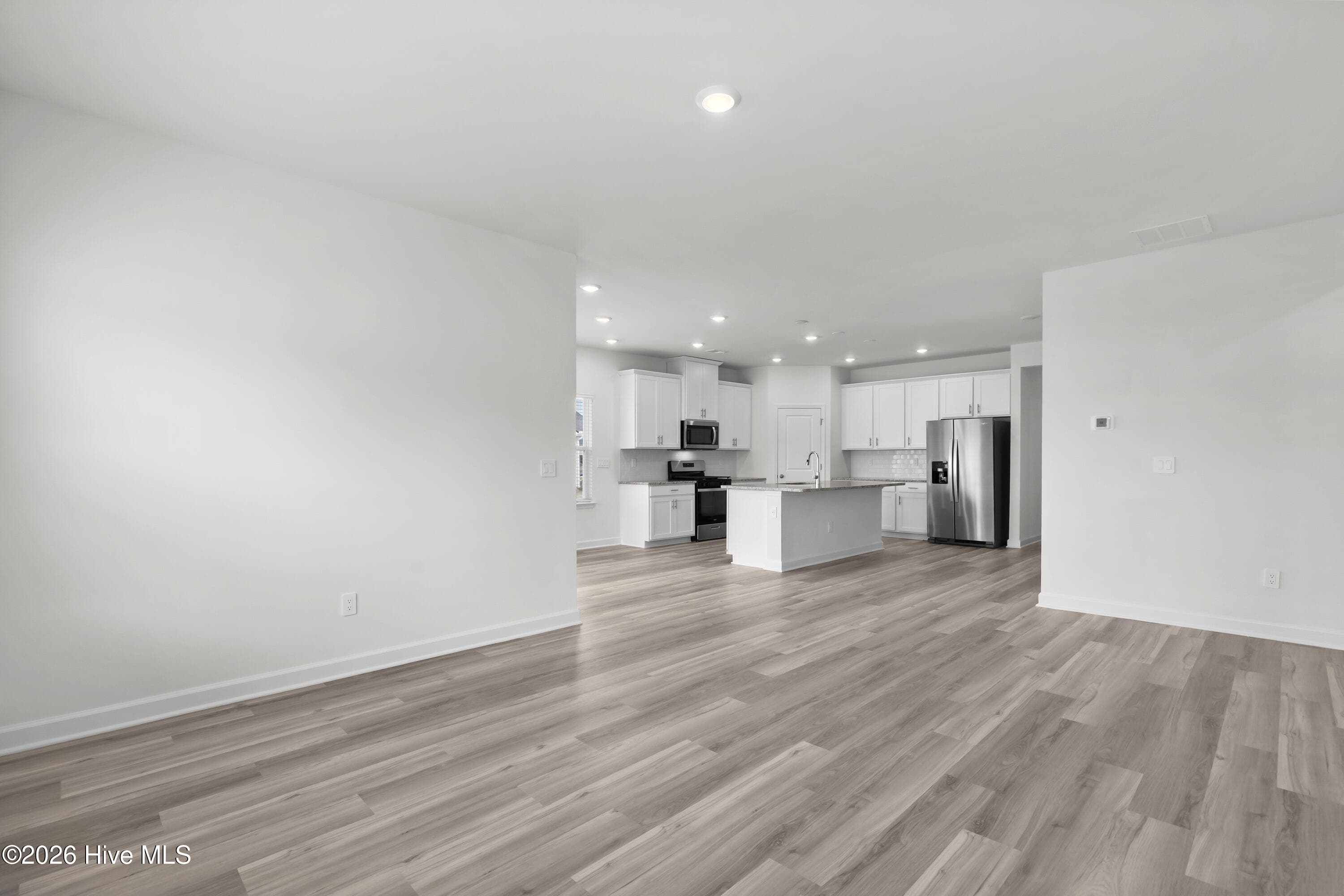 Photo is not of the actual home, but is an example photo of a completed home and may depict options and/or features that are not included - 4154 Generations Circle NW, Ash, NC 28420