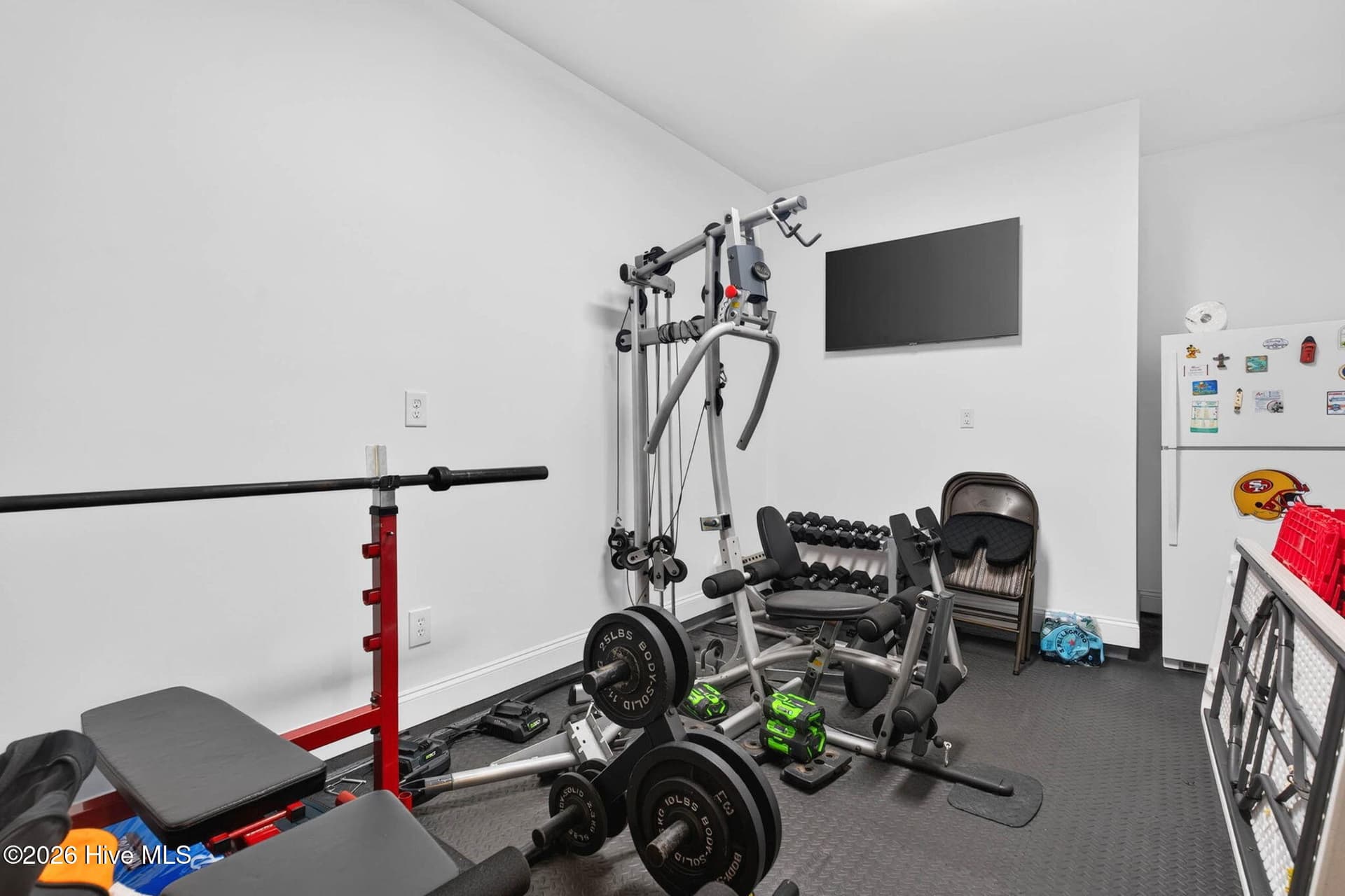 The spacious garage provides flexible room for a home gym, workshop, storage area, or everyday parking. - 139 Eagle Claw Drive, Calabash, NC 28467