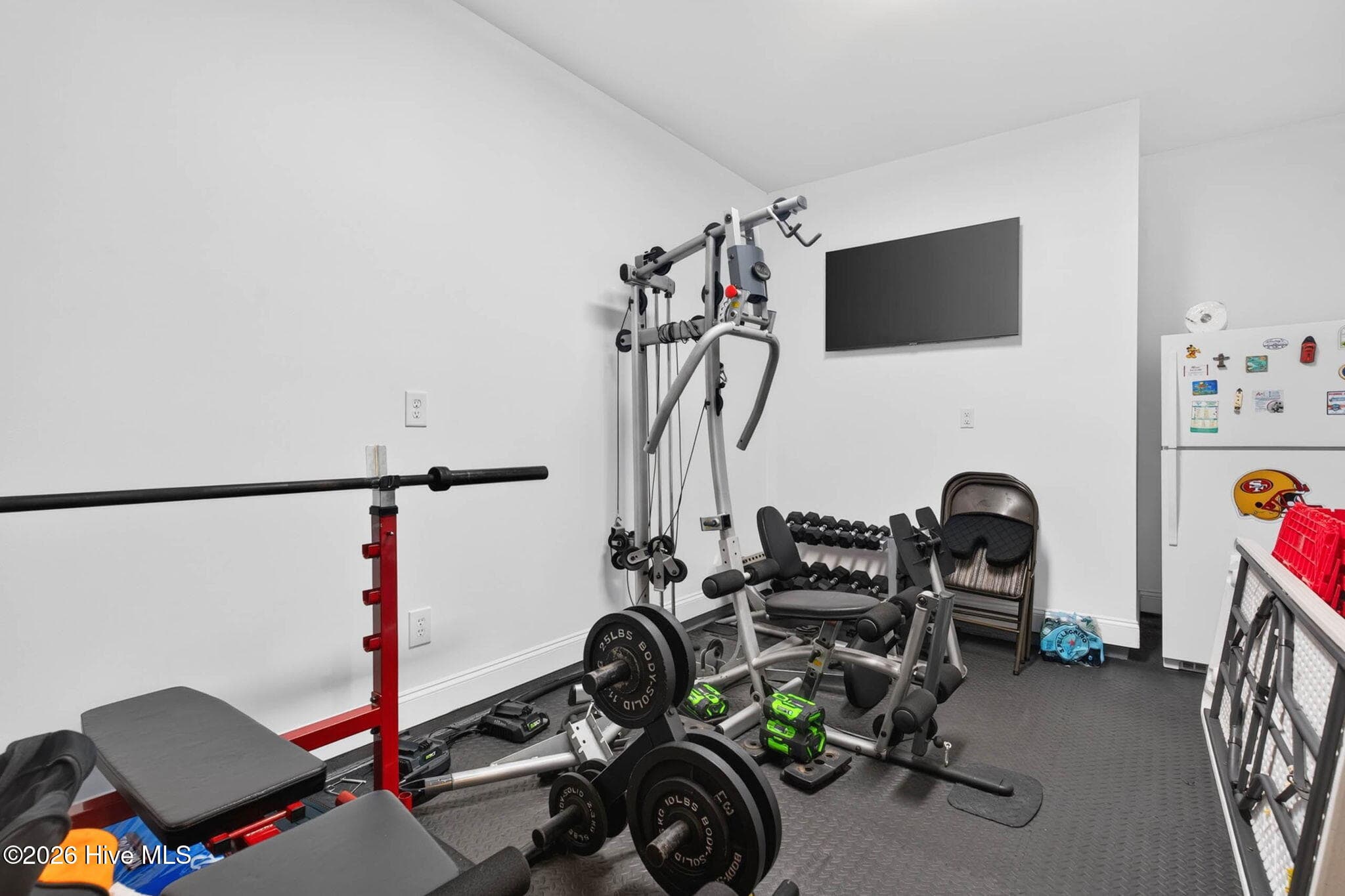 The spacious garage provides flexible room for a home gym, workshop, storage area, or everyday parking. - 139 Eagle Claw Drive, Calabash, NC 28467