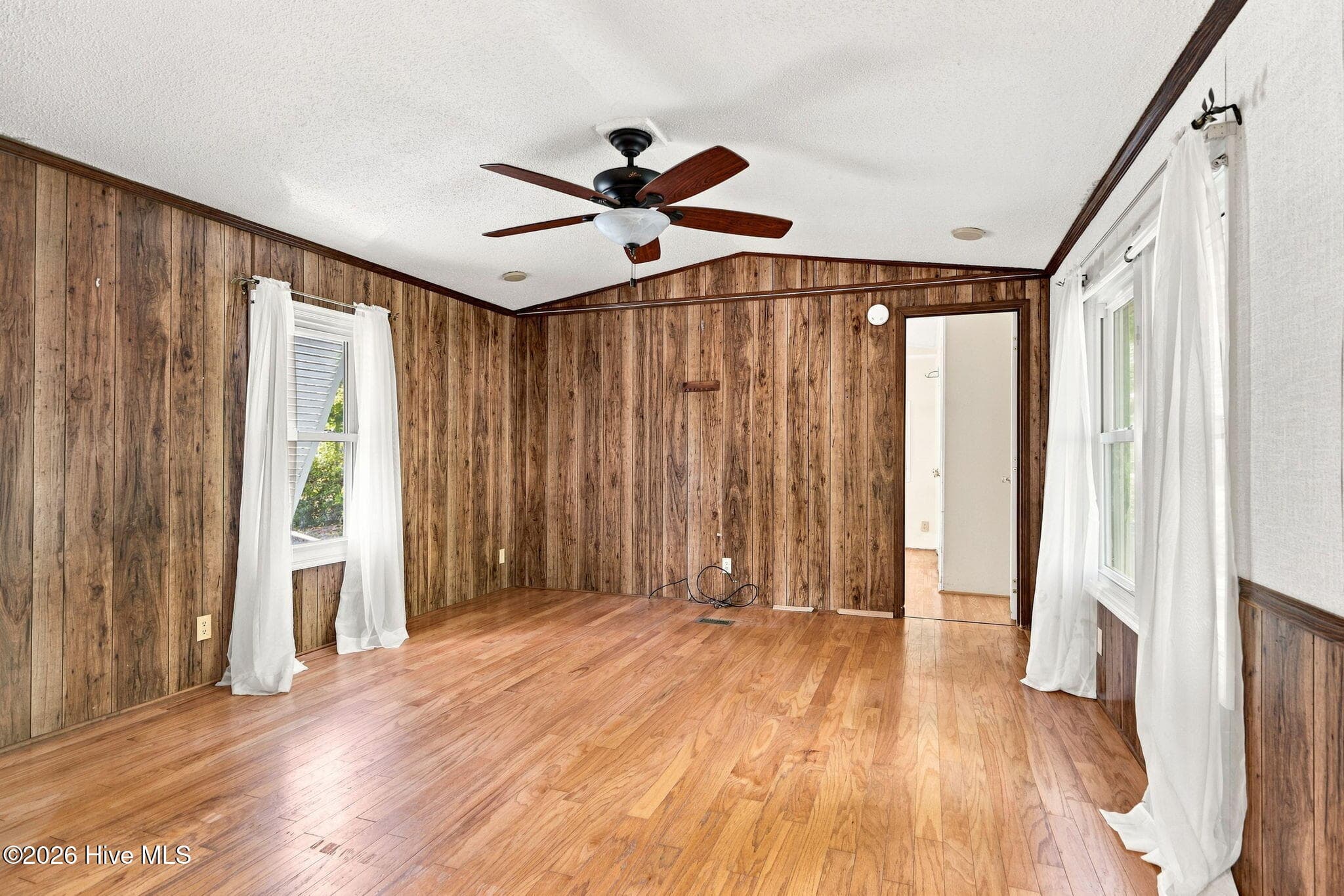 Living room to primary - 114 Lejeune Road, Cape Carteret, NC 28584
