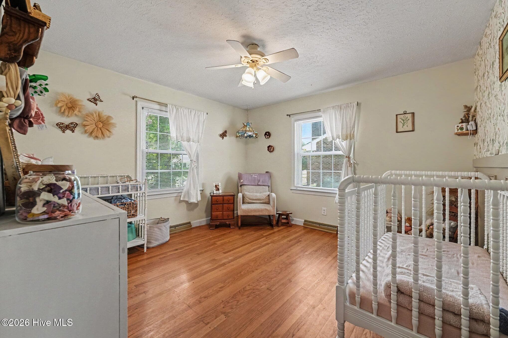 3rd bedroom with ceiling fan and hardwoods - 1017 S Claiborne Street, Goldsboro, NC 27530