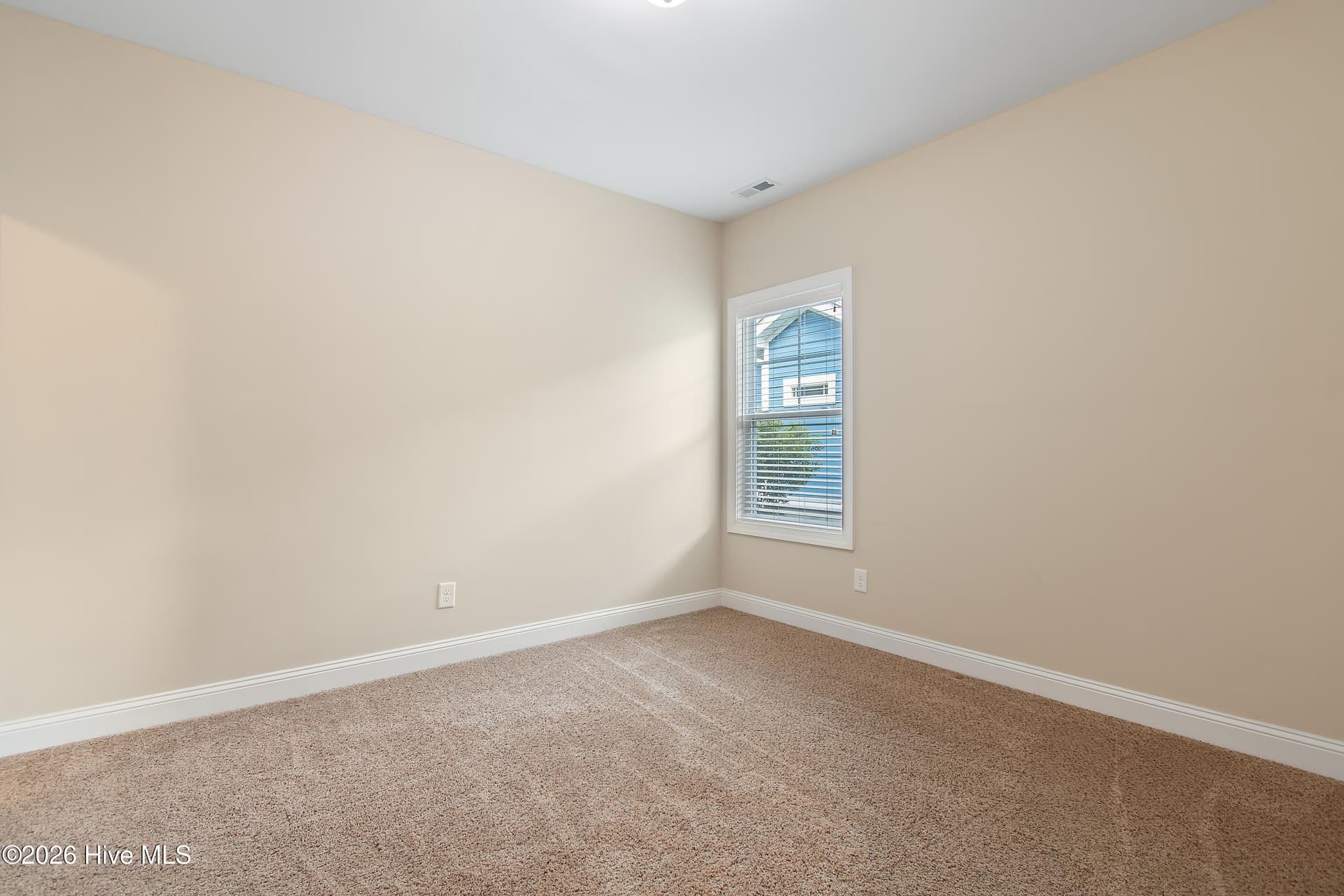 Bedroom #3 on first floor of home. - 1674 Back Bay Drive SW, Shallotte, NC 28470
