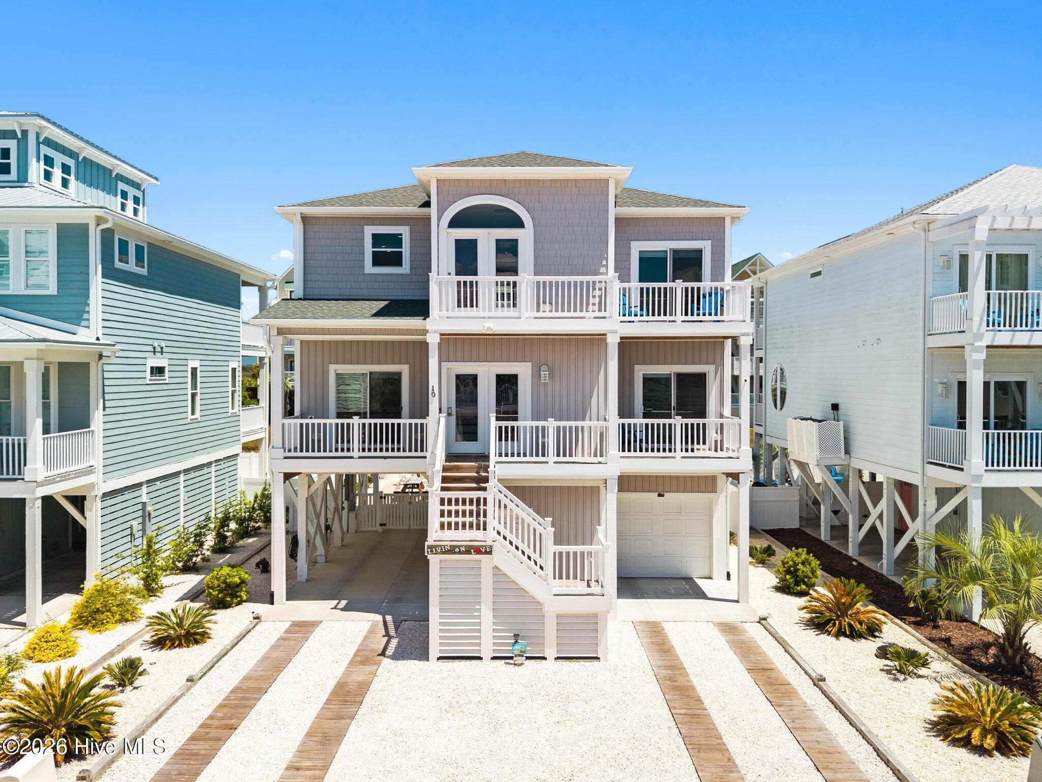 Single Family Residence at 10 Via Dolorosa Drive, Ocean Isle Beach, NC 28469, photo 2 of 71