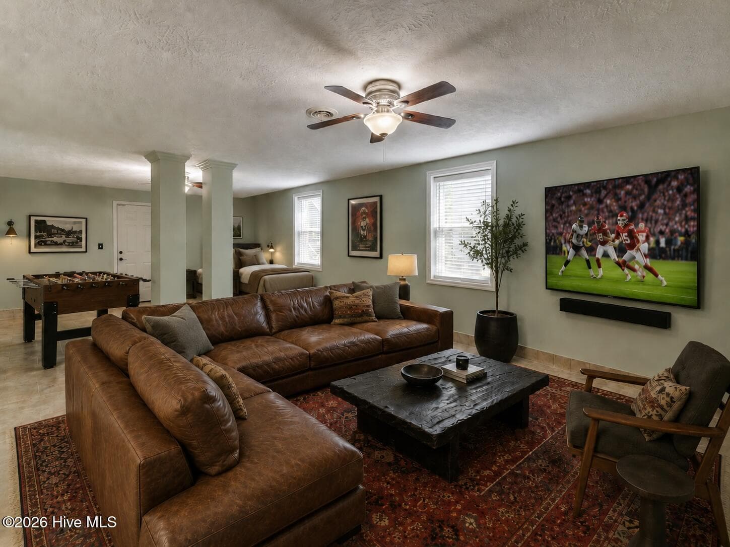 Bedroom 4 / Game Room, Lower Level: A comfortable finished lower level with room for movie nights, game days, guests, and everyday hangouts. - 16 Rapids Court, North Augusta, SC 29841