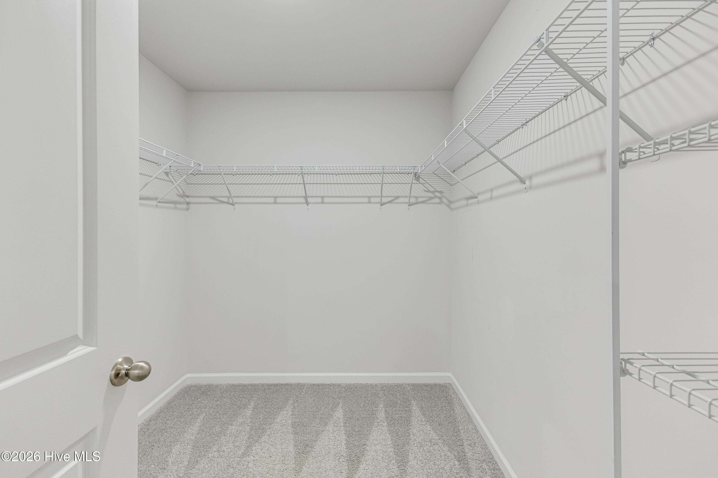 large walk in closet - 1774 Culdees Lane SE, Bolivia, NC 28422