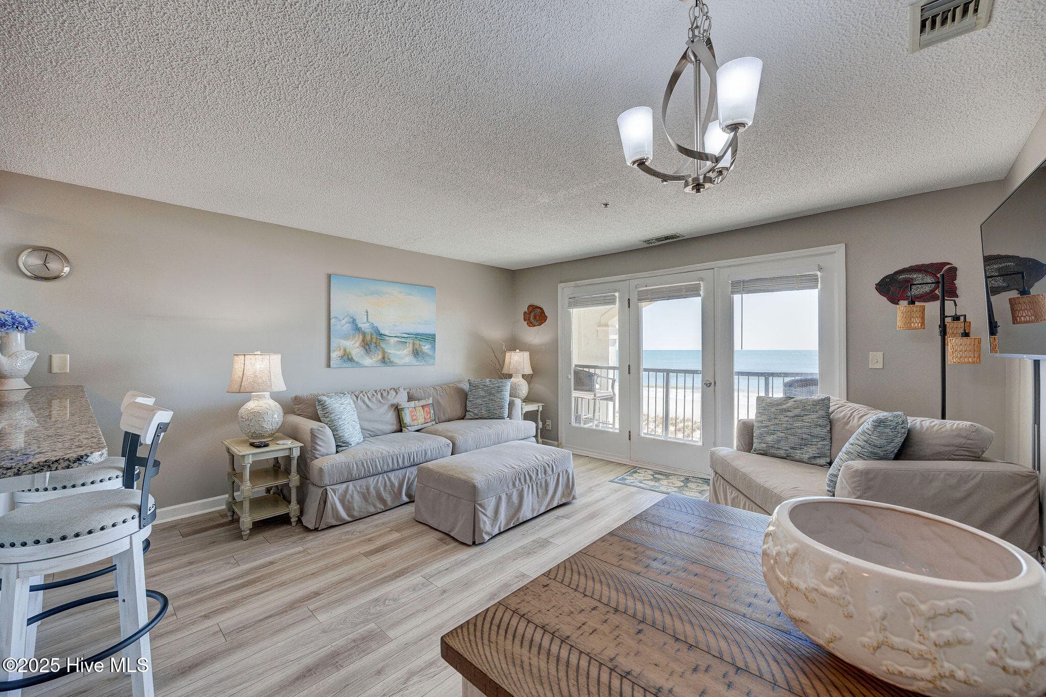 Living room with ocean view - 790 New River Inlet Road Unit 115a, North Topsail Beach, NC 28460