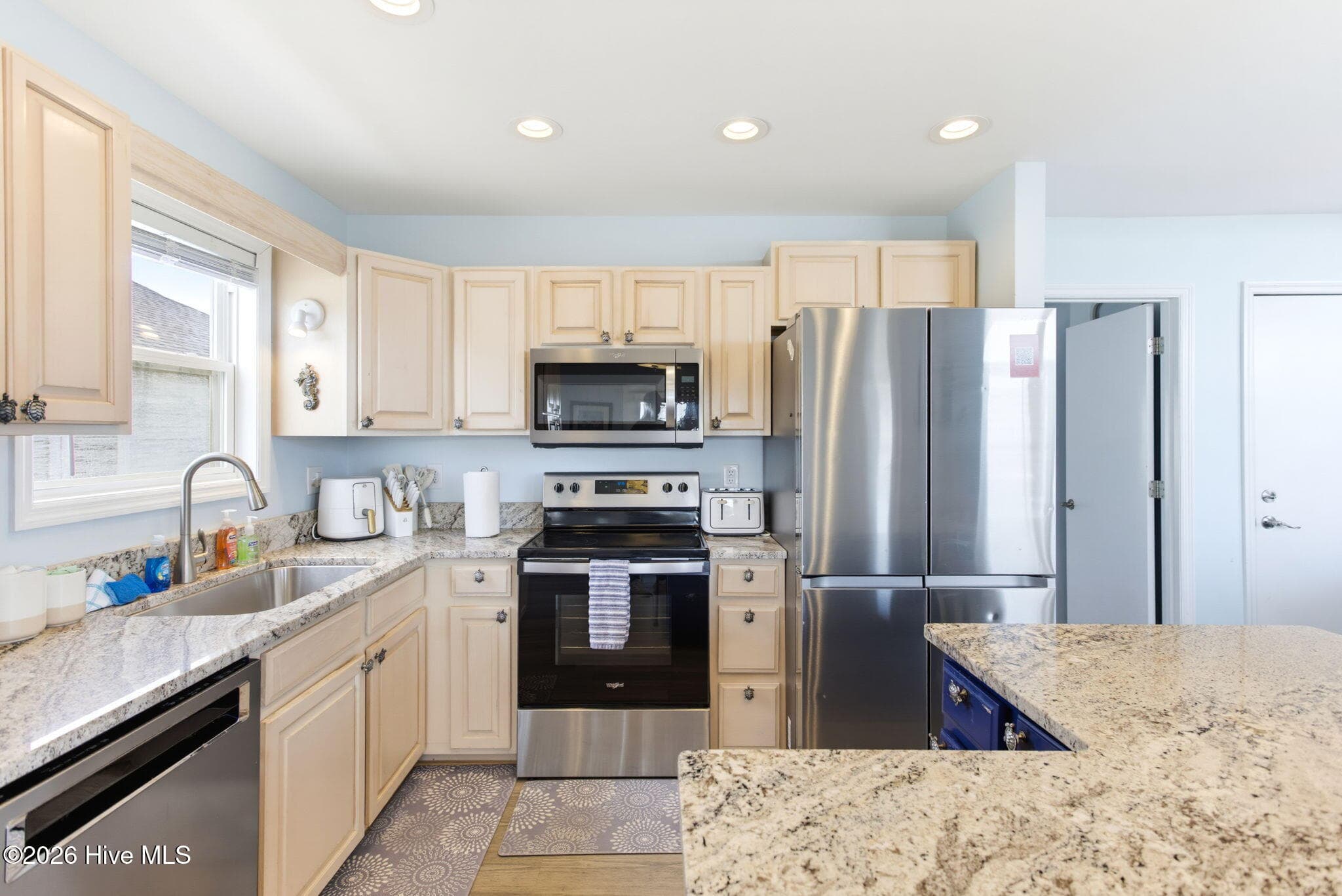 Kitchen with stainless appliances - 2330 W Beach Drive, Oak Island, NC 28465