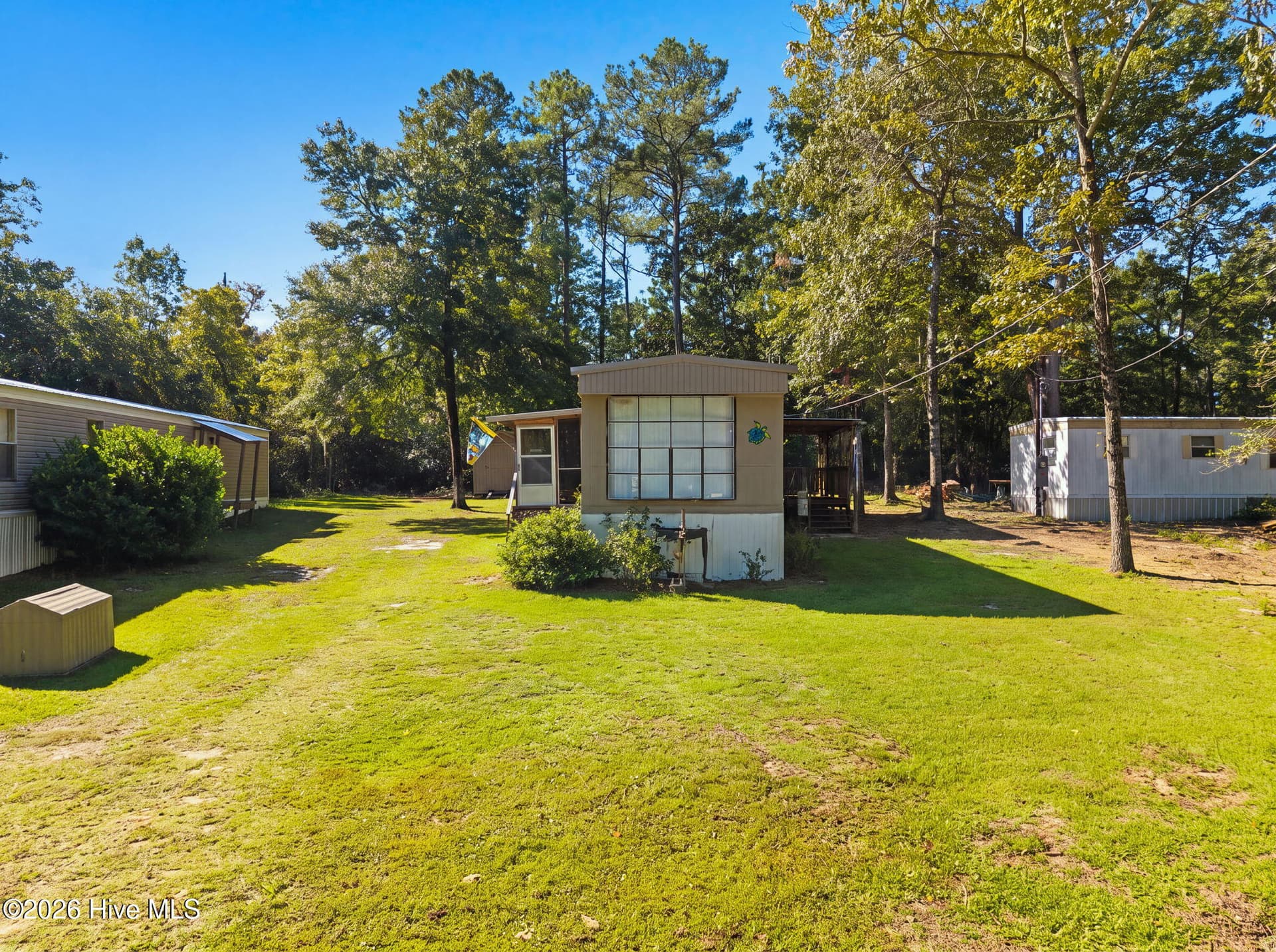 Manufactured Home at 1178 Madera Place SW, Supply, NC 28462, photo 2 of 41