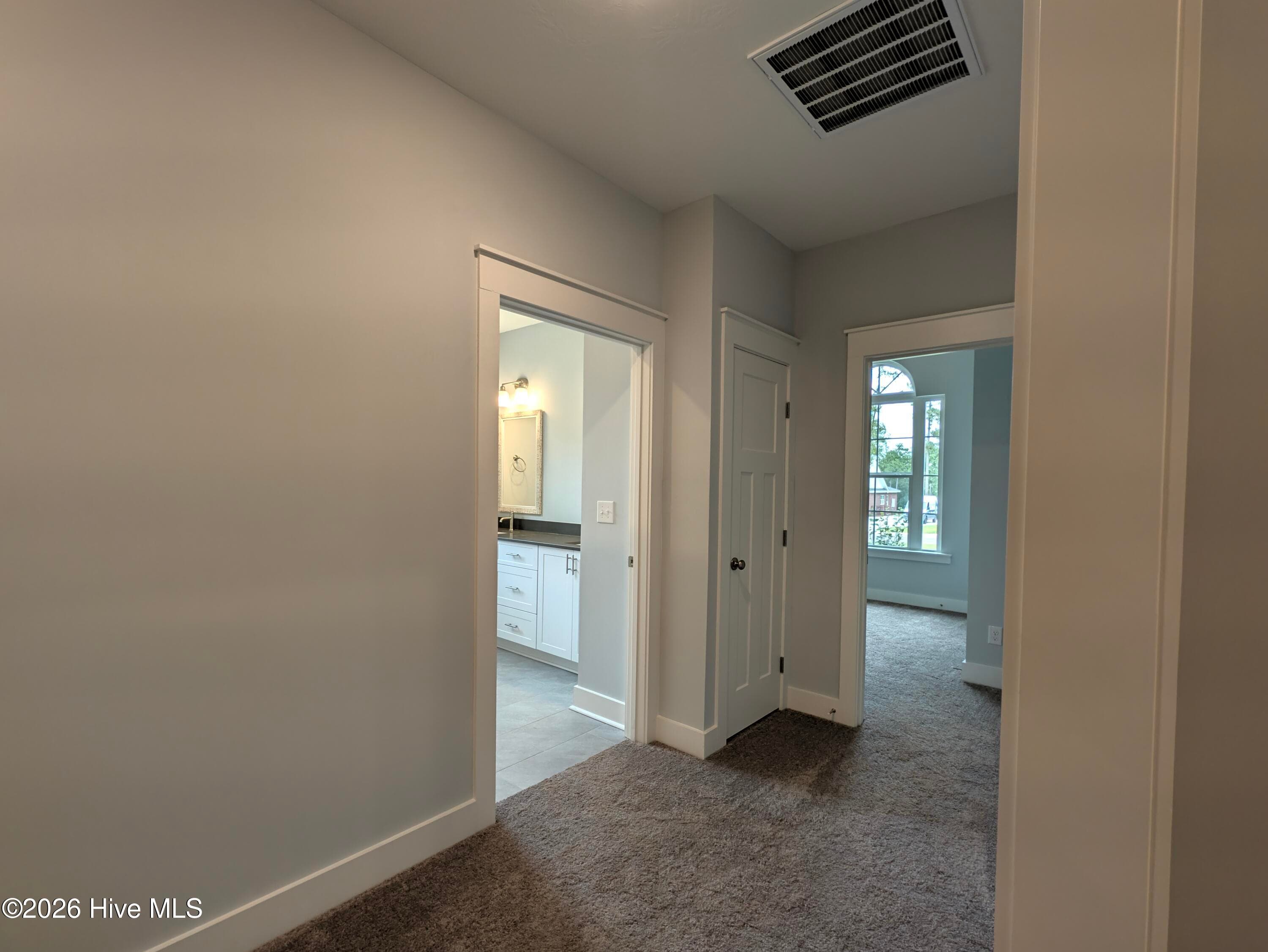 Spacious hall to secondary bedrooms - 434 Longshadow Drive, Aiken, SC 29803