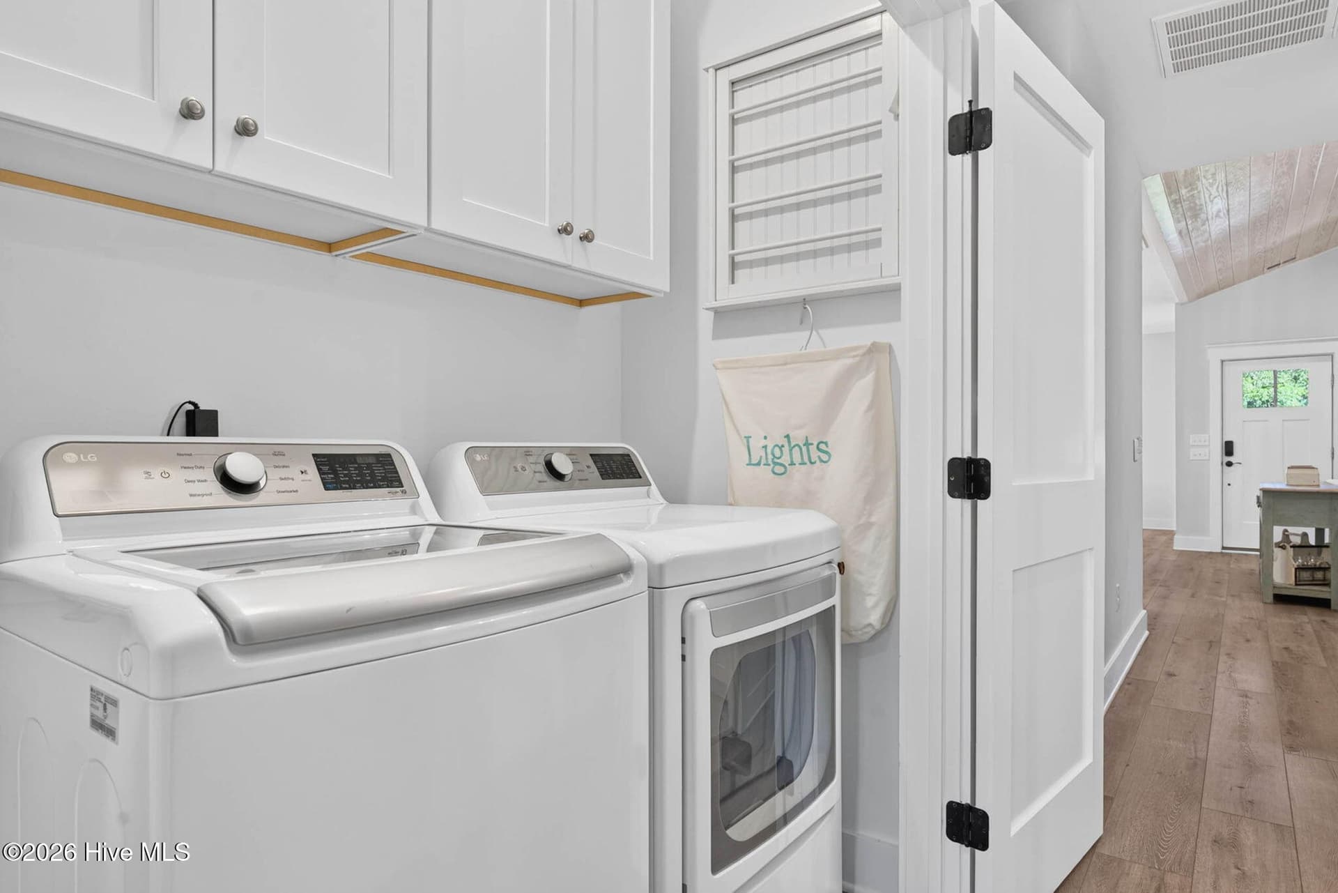 Laundry Closet with built in storage - 101 SE 14th Street, Oak Island, NC 28465