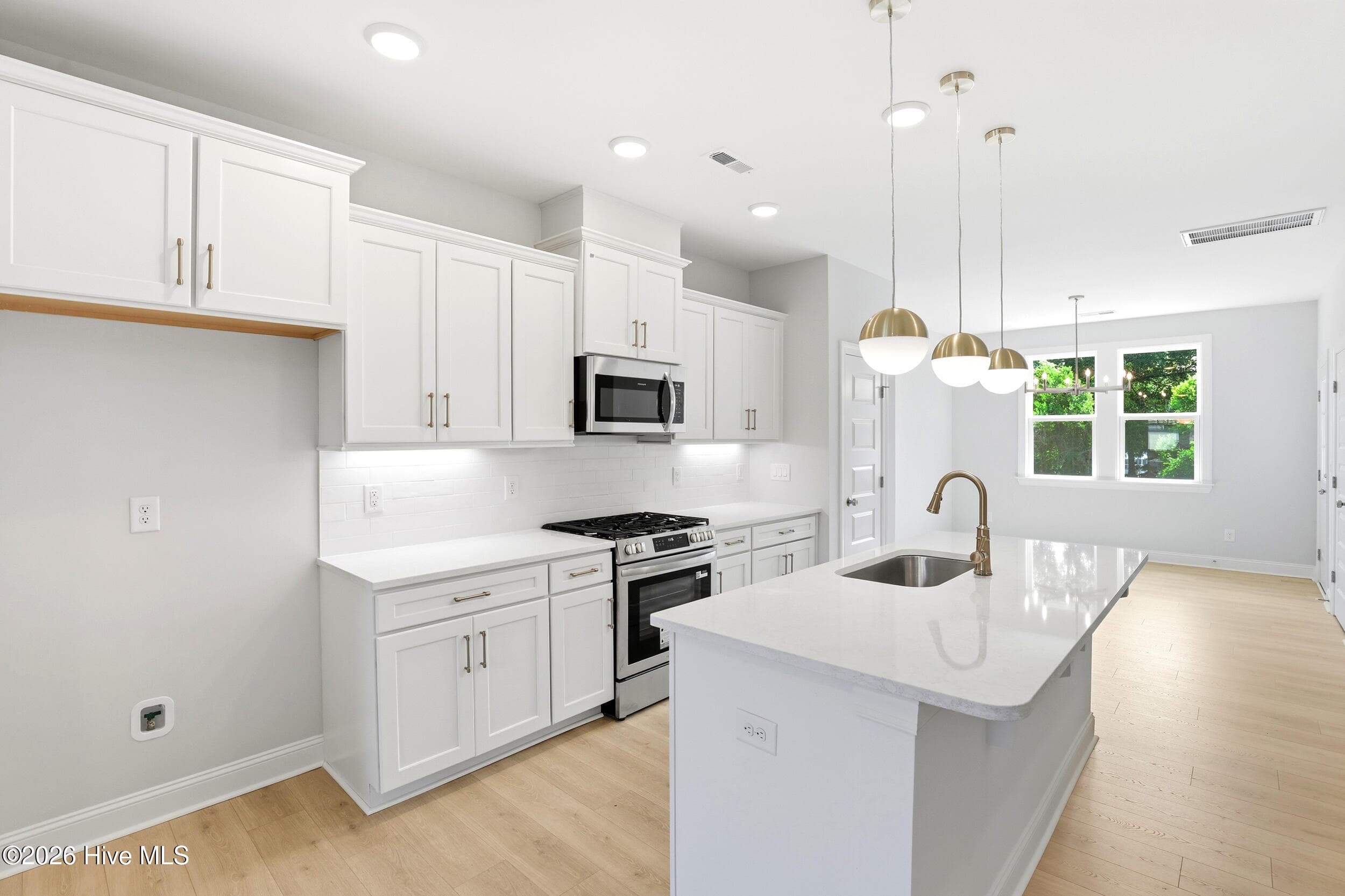 Photo is of a simliar townhome - 516 Mcrae Street 102, Wilmington, NC 28401