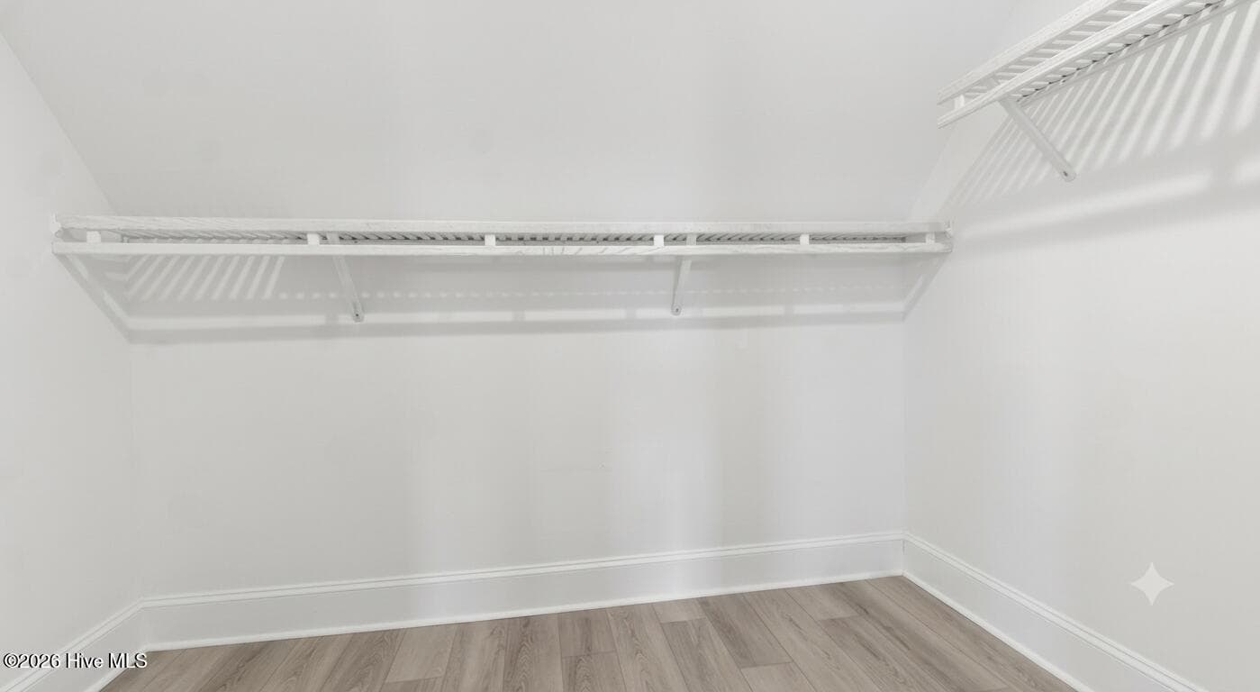 Another conditioned walk-in closet upstairs so much storage in this house - 2359 Weeping Birch Road NE, Leland, NC 28451