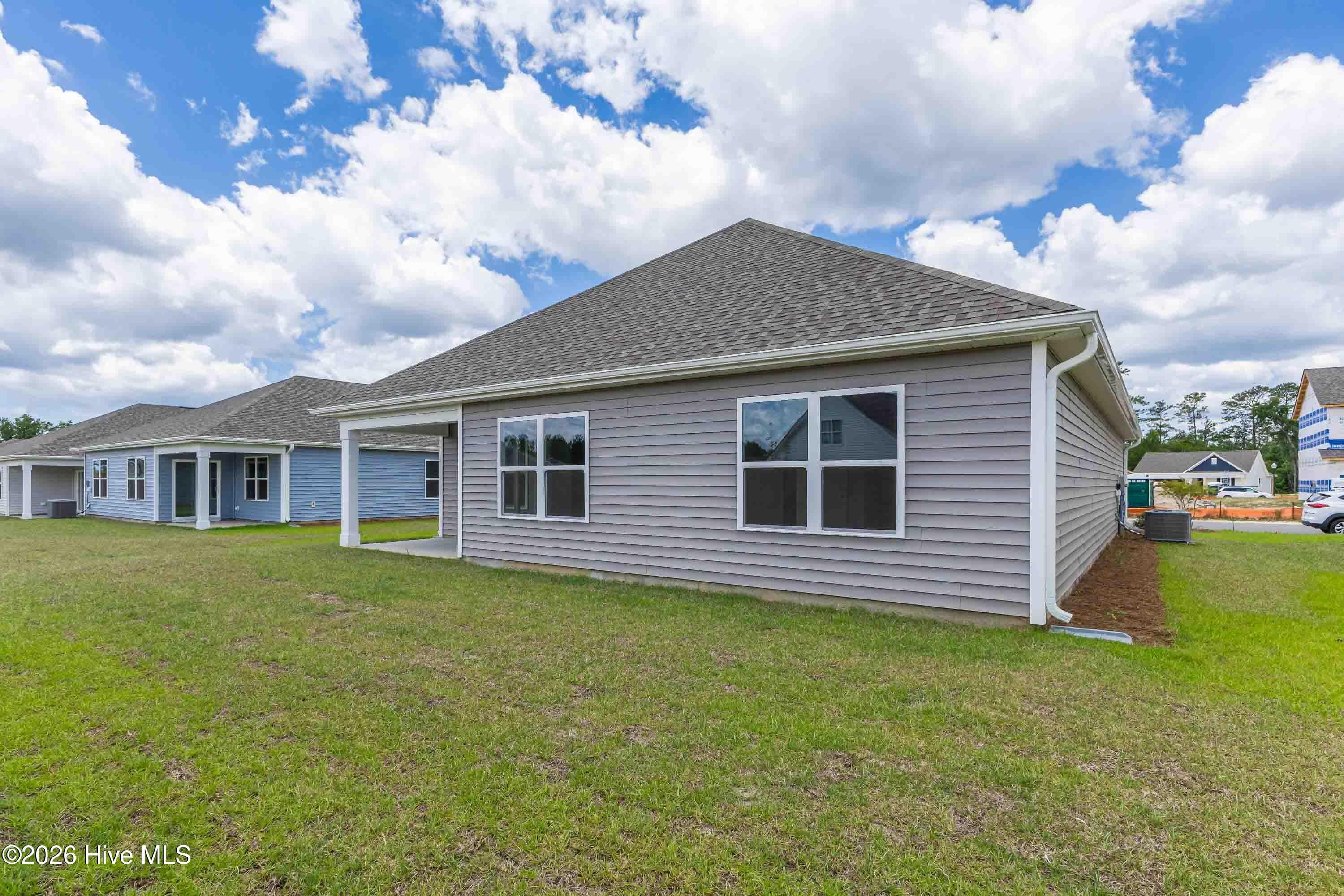 Photos are of a similar, completed home. Actual colors may vary - 3085 Golden Field Drive SE Lot 78, Bolivia, NC 28422