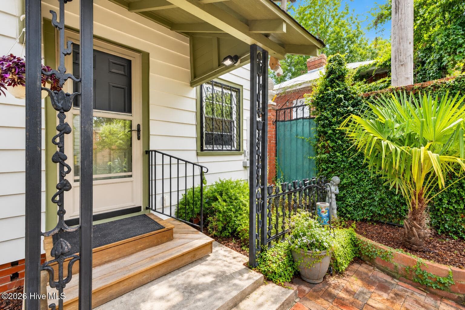back porch leads out to private walled courtyad - 5 N 20th Street, Wilmington, NC 28405