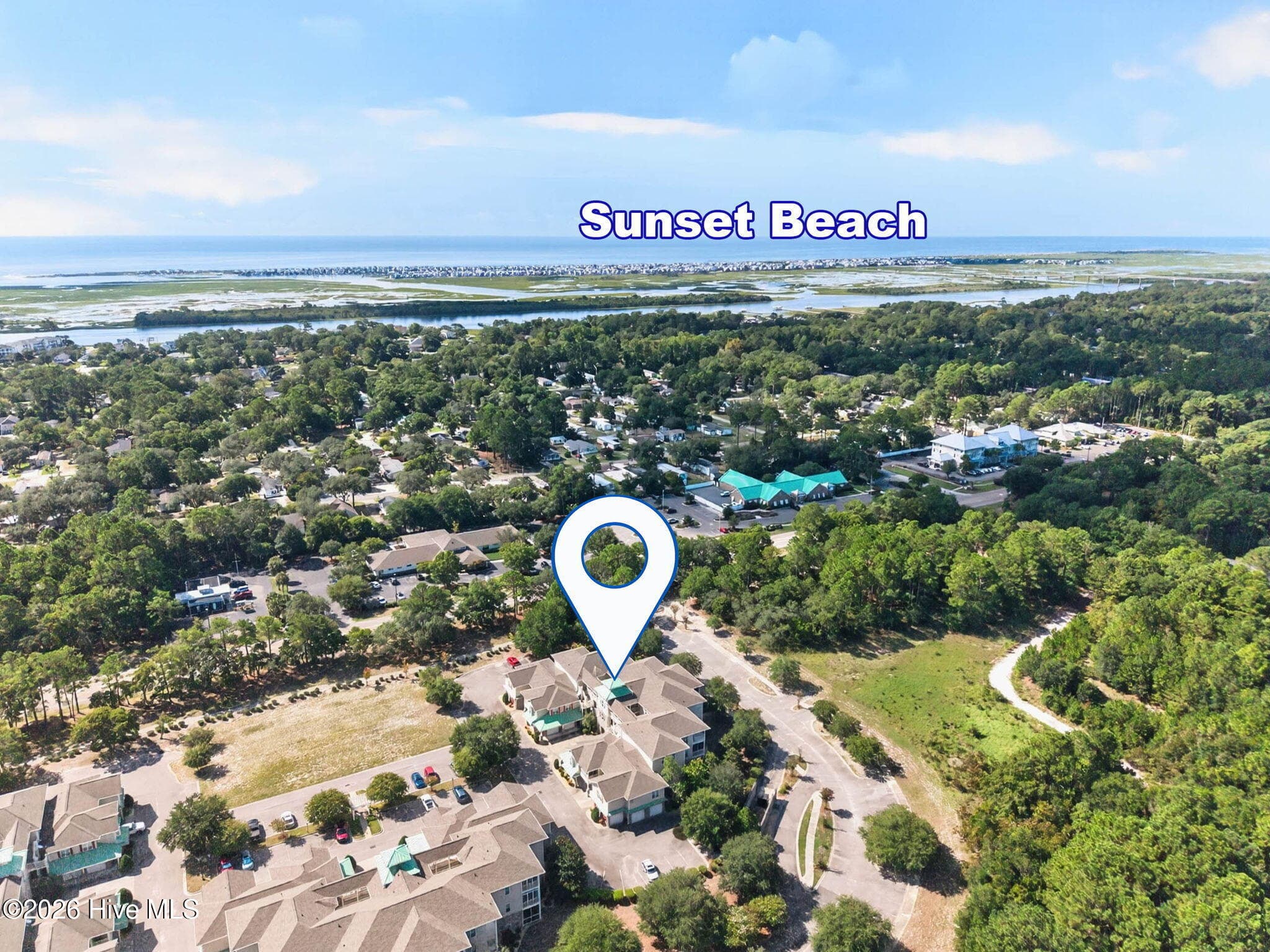 Within walking distance of grocery stores, restaurants, and many shops - 7825 High Market Street #303, Sunset Beach, NC 28468