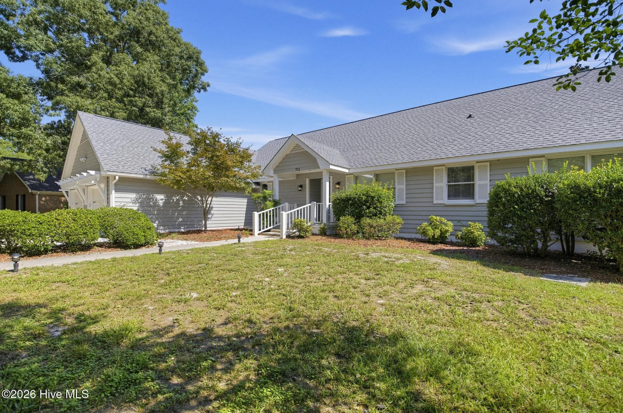 Single Family Residence at 711 N Green Tee Road, Hampstead, NC 28443, photo 2 of 21
