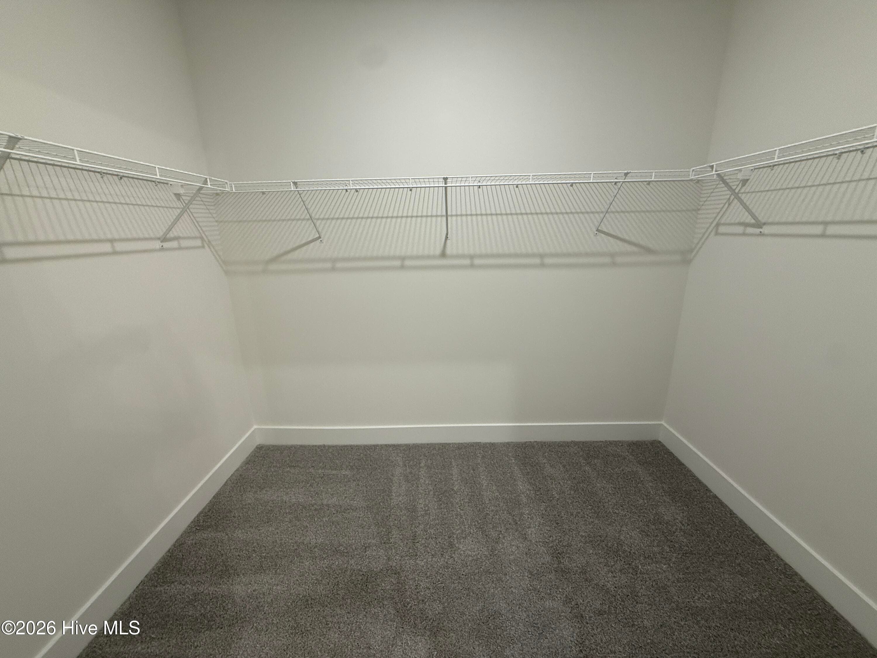 Representative photo Primary walk in closet - 2129 Sandbrook Loop, Leland, NC 28451