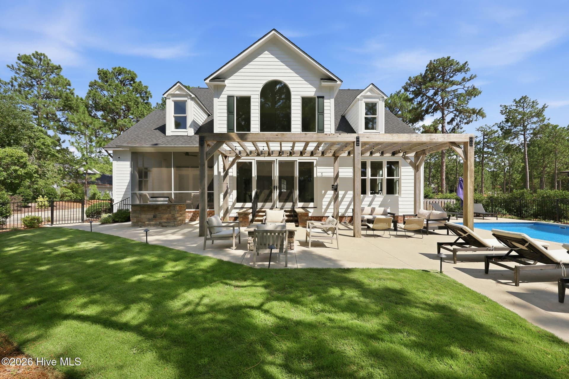 Rear exterior and pool - 102 Chesterfield Drive, Pinehurst, NC 28374