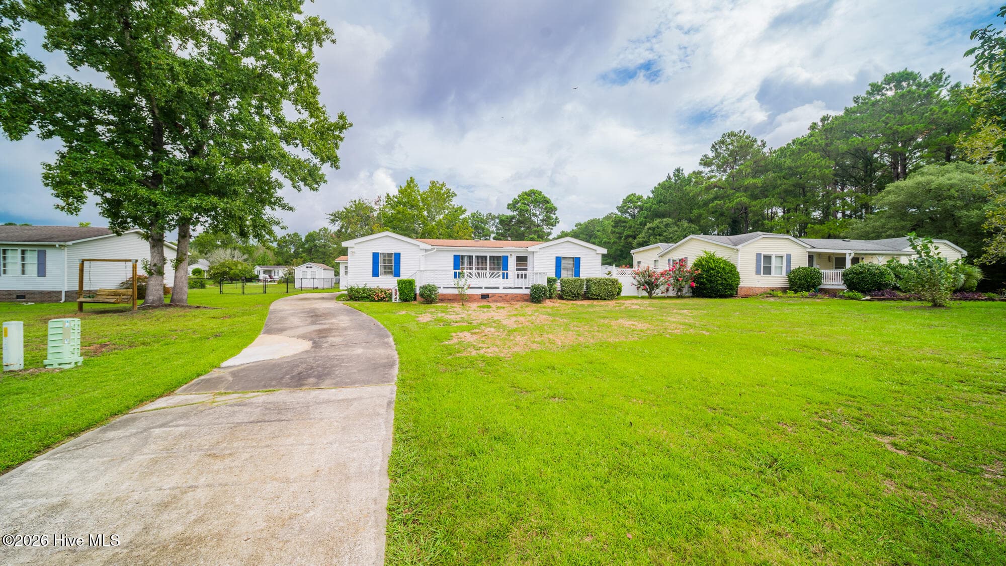 Deep front lawn provides privacy - 1076 Clubview Lane SW, Calabash, NC 28467