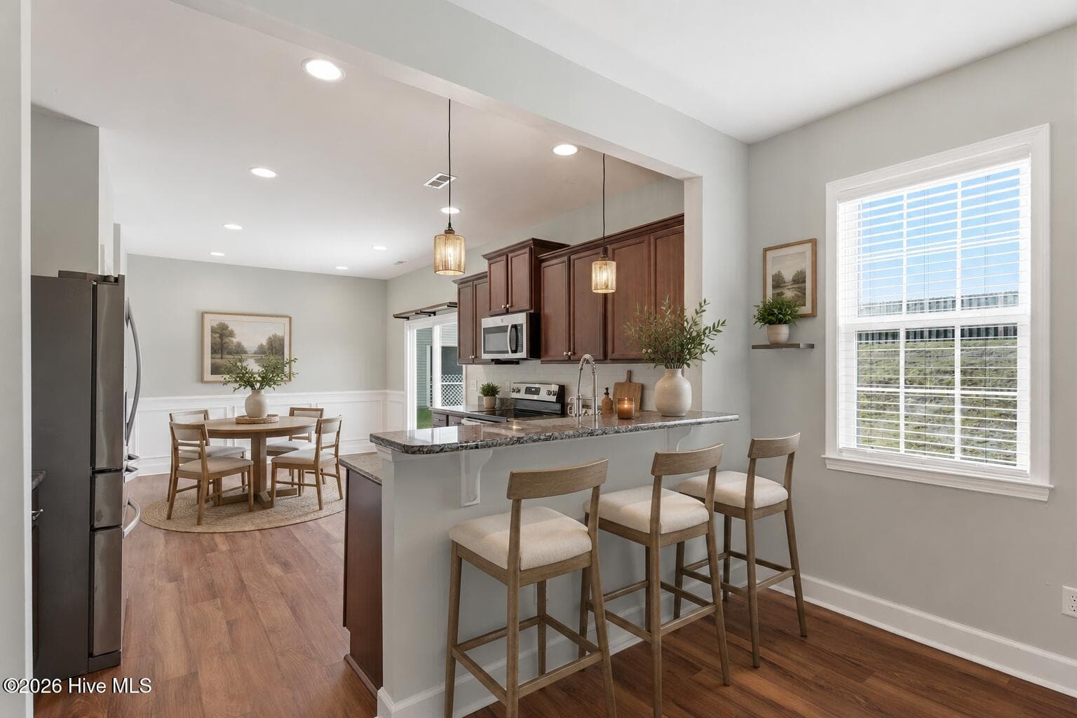 bar/kitchen area virtually staged - 447 Avendale Drive, Rocky Point, NC 28457