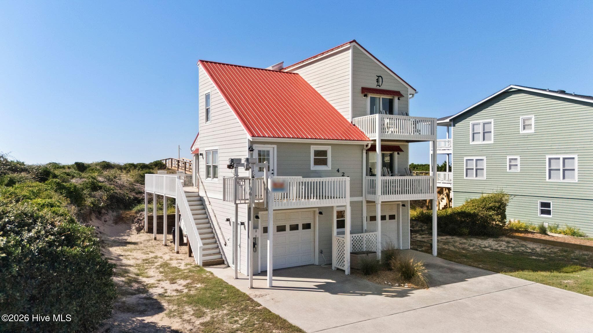Single Family Residence at 425 Caswell Beach Road, Oak Island, NC 28465, photo 3 of 73