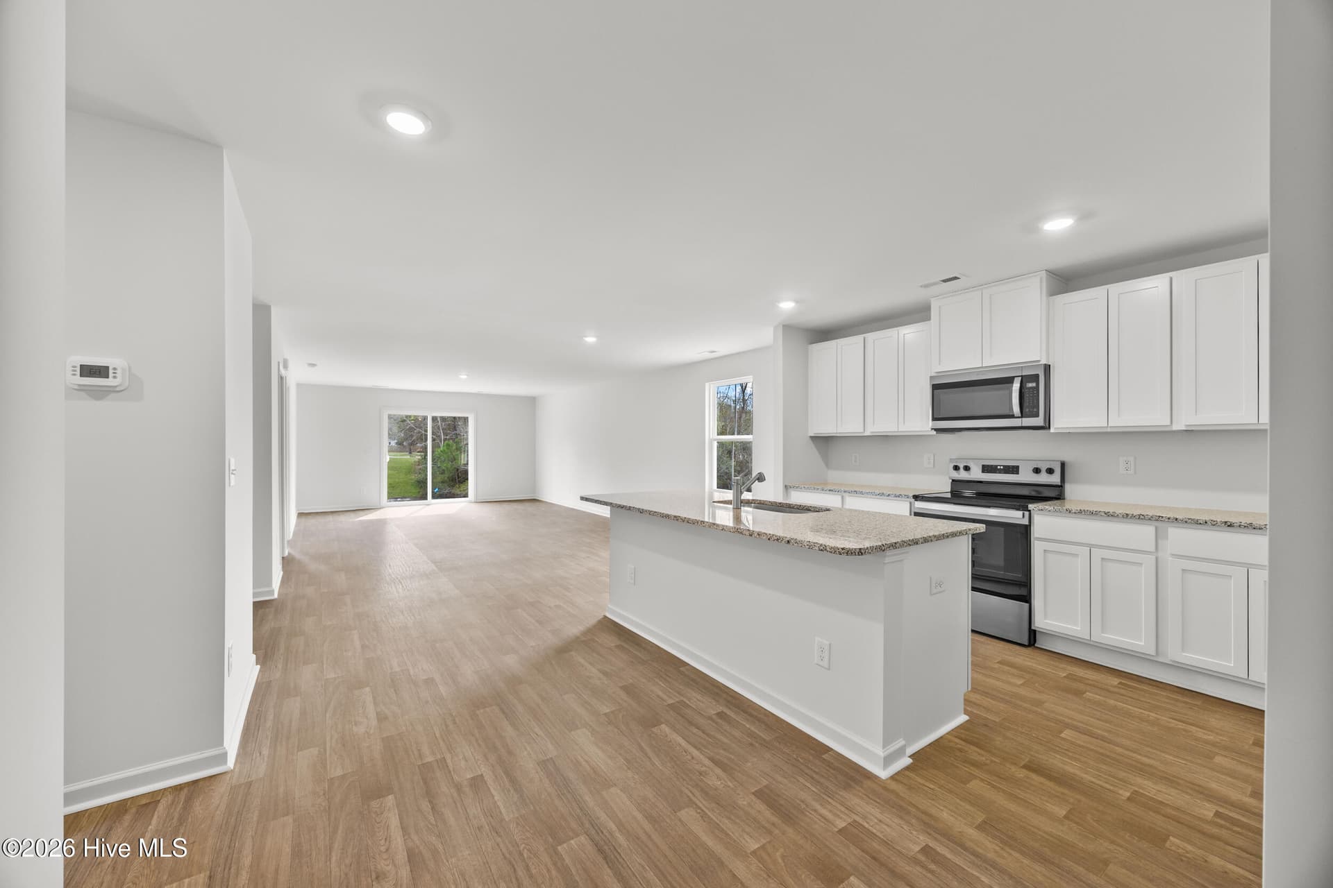 Home shown is a representation of the floor plan and may include optional features or upgrades. Elevations, materials, colors, finishes, square footage, and included features may vary from the actual home. Please consult Sales Representative for complete details. - 4613 Swimming Lane 30, Shallotte, NC 28470