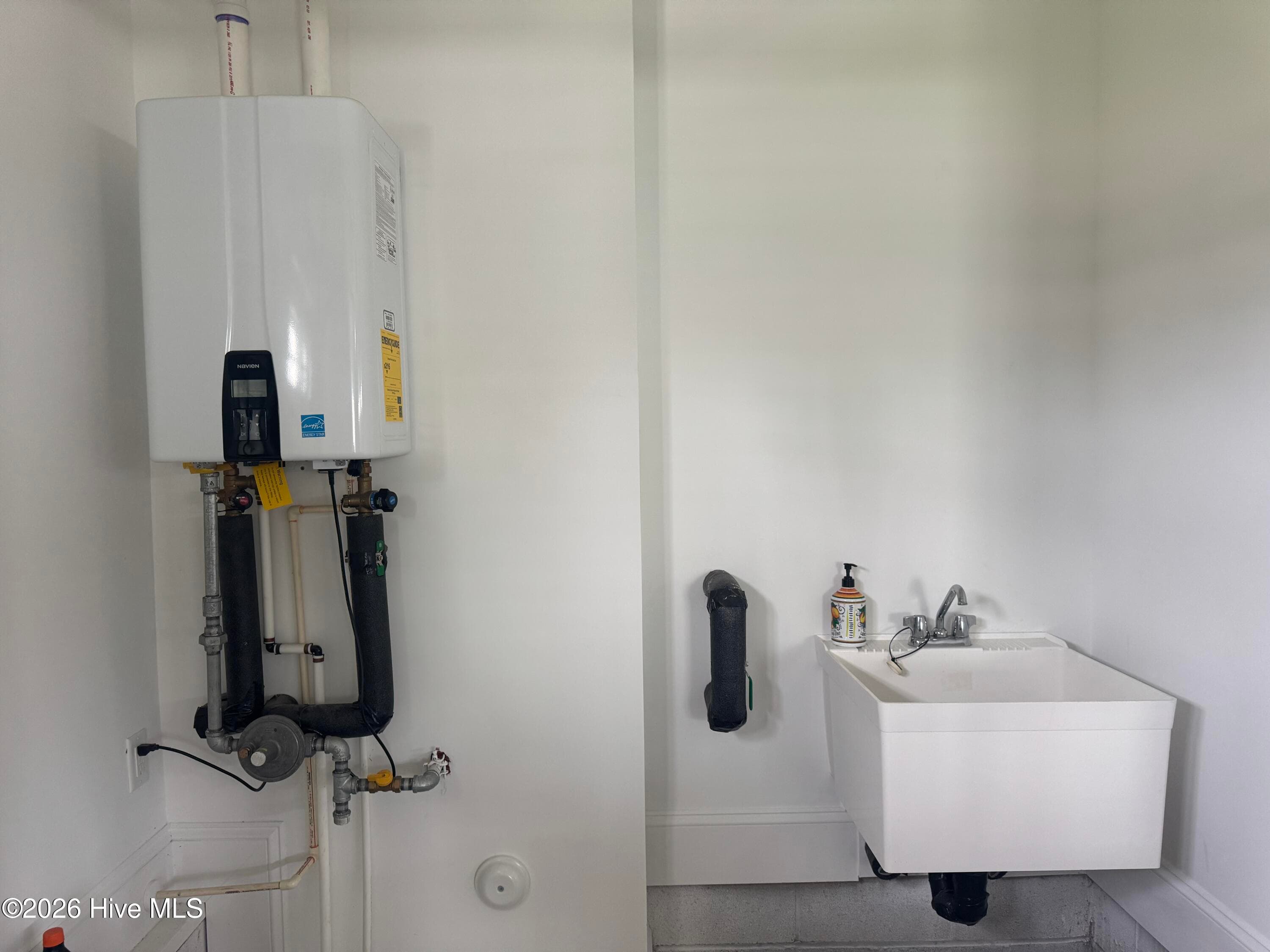 Tankless water heater and laundry sink - 2359 Weeping Birch Road NE, Leland, NC 28451