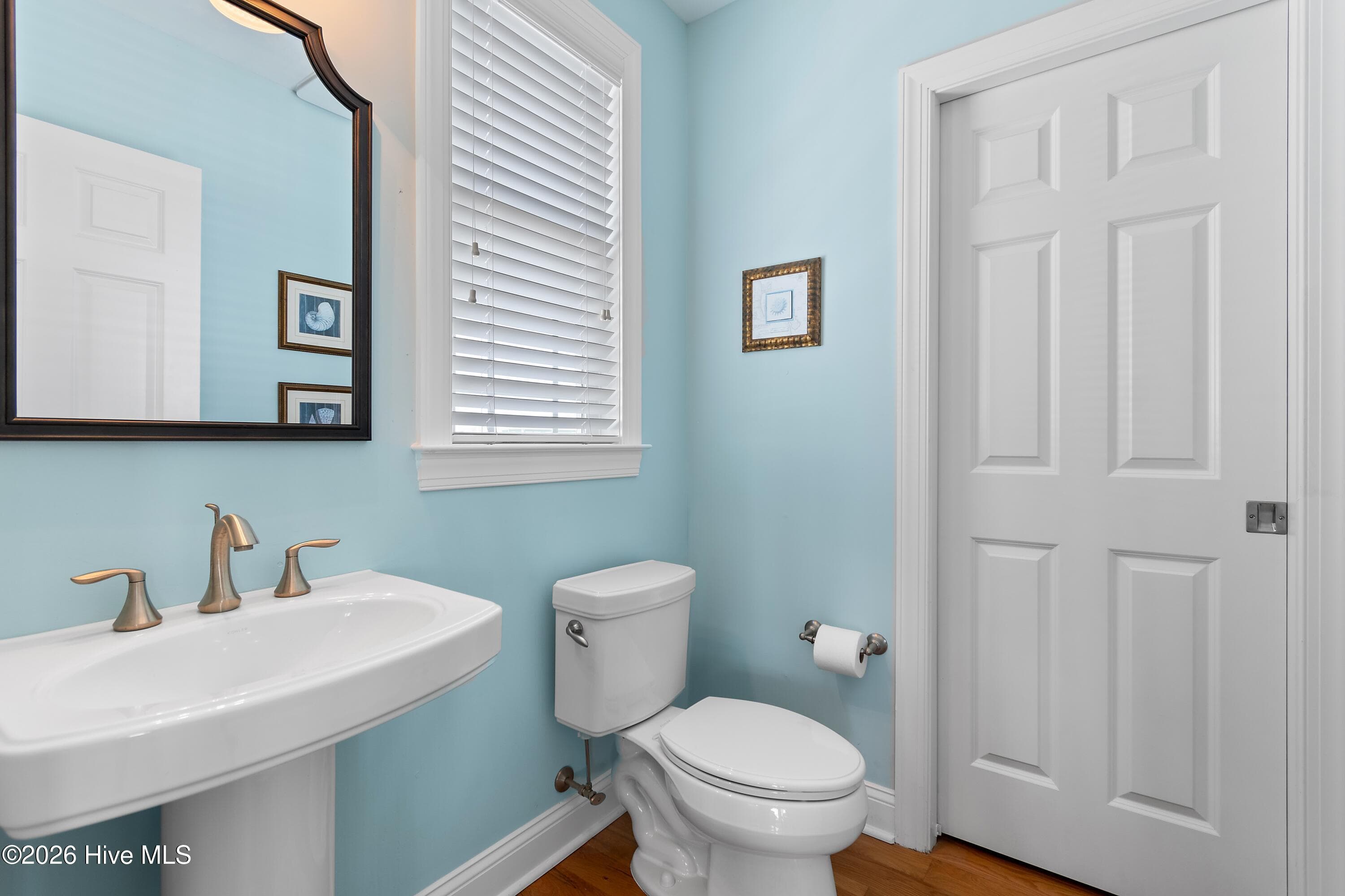 Powder room off Living area - 1046 Tide Ridge Drive, Holden Beach, NC 28462