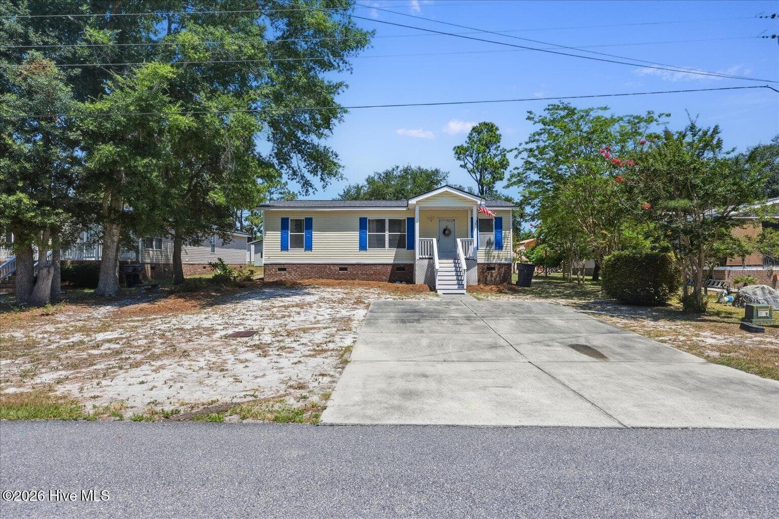 Manufactured Home at 703 Dogwood Drive, Sunset Beach, NC 28468, photo 2 of 31
