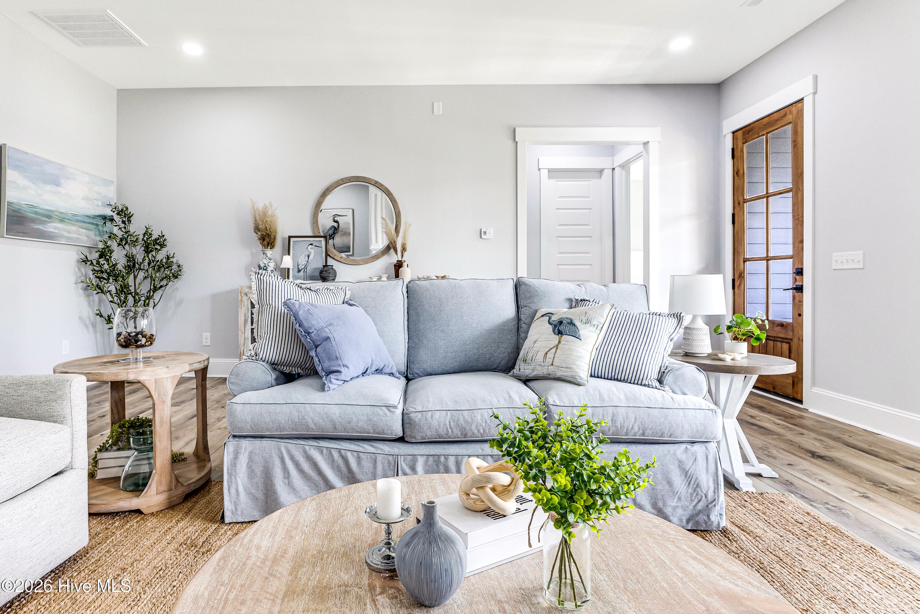 The 10ft ceilings and 8ft door frames create an open and airy feeling through out the home. - 5113 Minnesota Drive SE, Southport, NC 28461