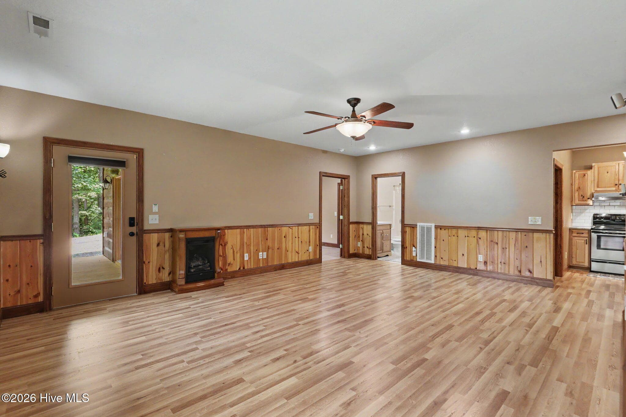 Spacious finished lower level with separate entrance offers exceptional flexibility for separate living. - 210 Majestic Drive, Hayesville, NC 28904