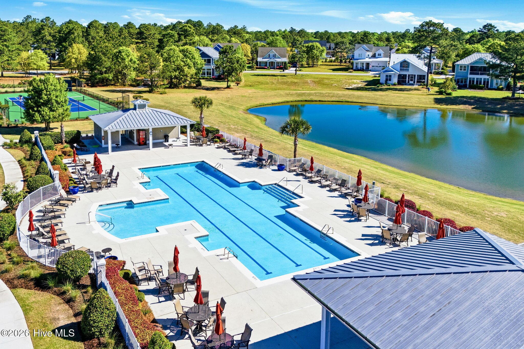 Outdoor pool area - 3784 Crab Catcher Loop NE, Leland, NC 28451