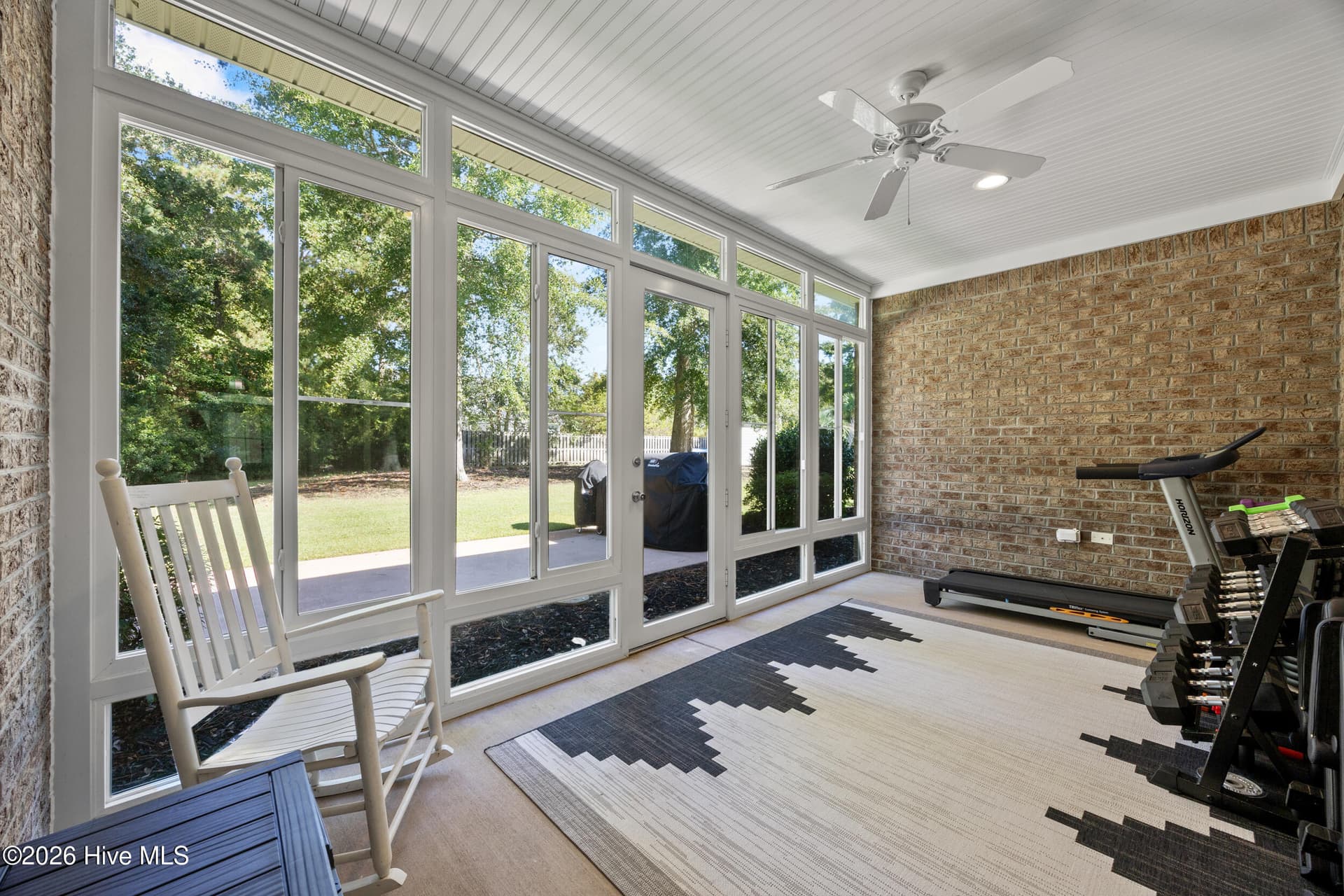 Sunroom and access to the back yard - 323 Crown Pointe Drive, Hampstead, NC 28443